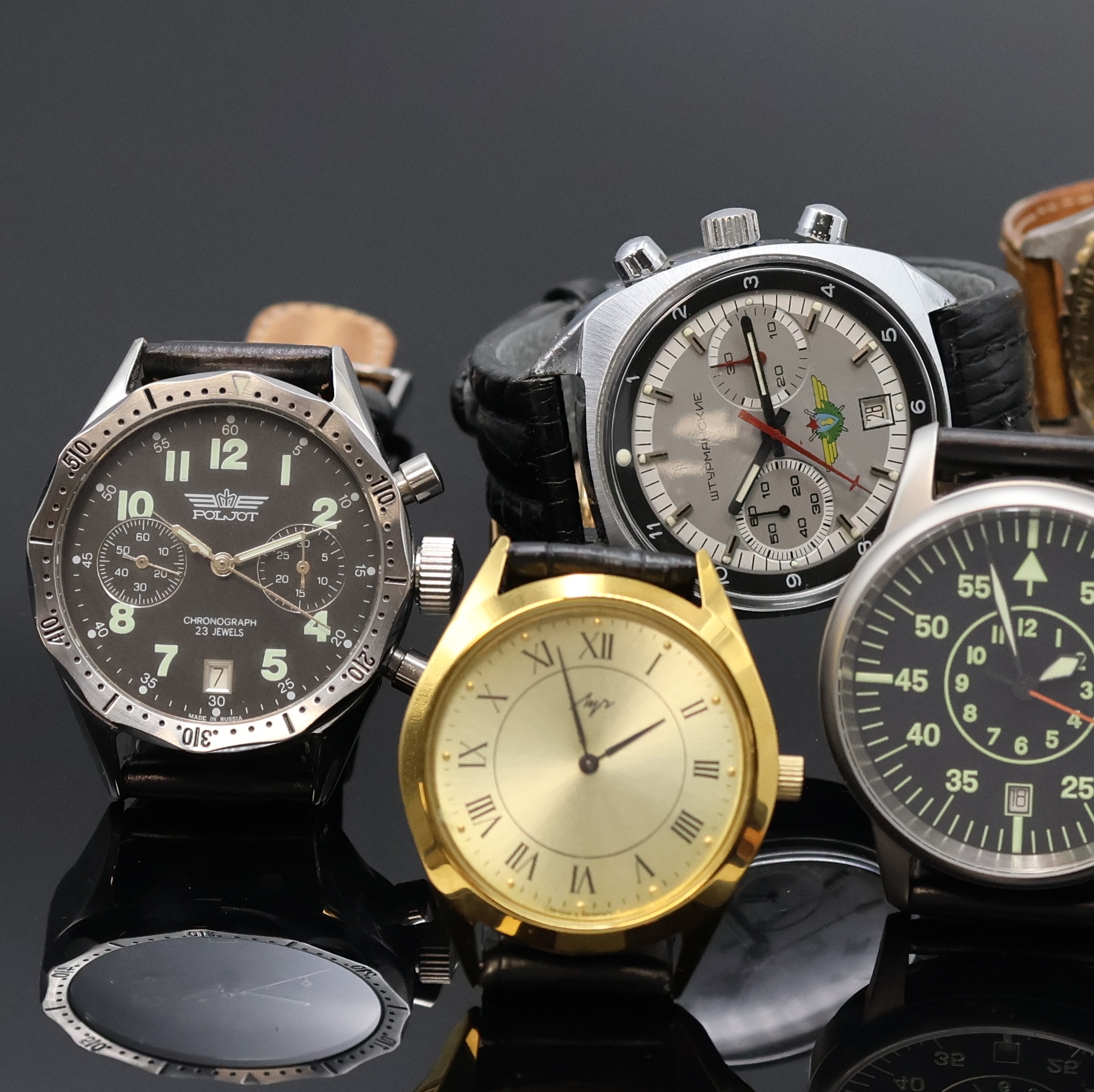 Detail a: 6 Russische Armbanduhren, Russland um 1980- 2010, Handaufzug/Automatik, 4 Chronographen, 2 Armbanduhren, Stahl/vergoldete Geh., Böden verschr. u. ...