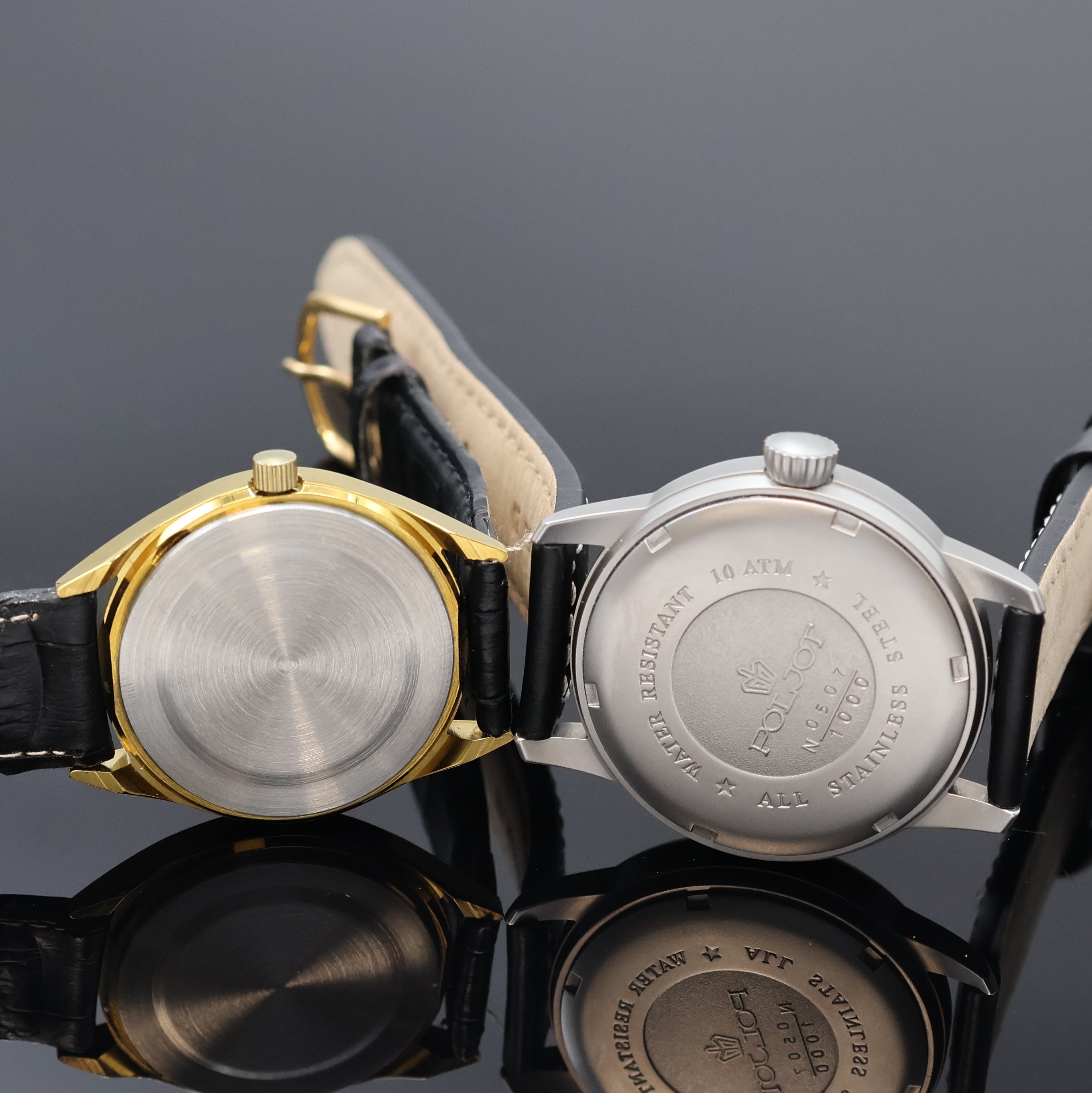 Detail d: 6 Russische Armbanduhren, Russland um 1980- 2010, Handaufzug/Automatik, 4 Chronographen, 2 Armbanduhren, Stahl/vergoldete Geh., Böden verschr. u. ...