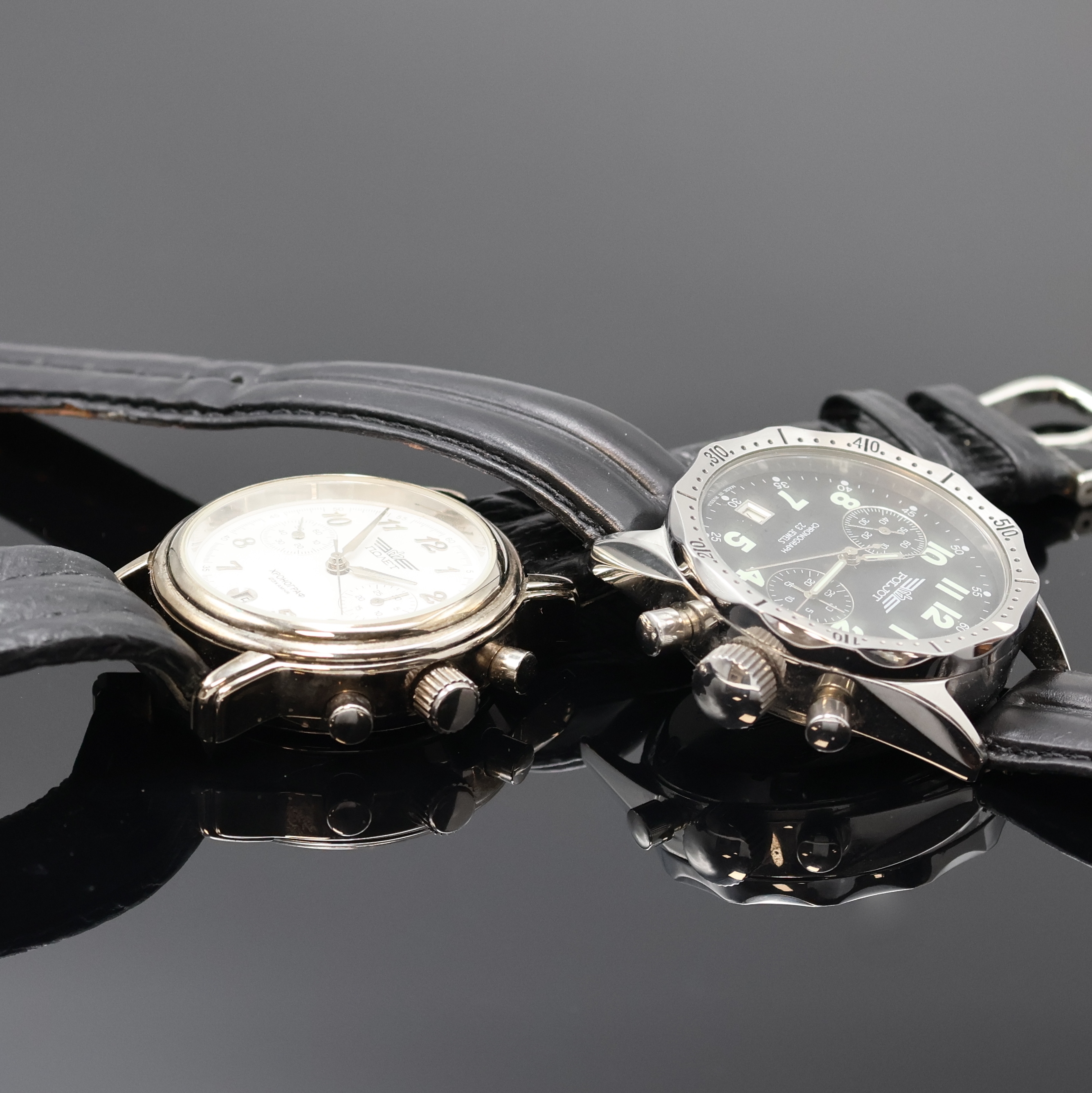 Detail e: 6 Russische Armbanduhren, Russland um 1980- 2010, Handaufzug/Automatik, 4 Chronographen, 2 Armbanduhren, Stahl/vergoldete Geh., Böden verschr. u. ...