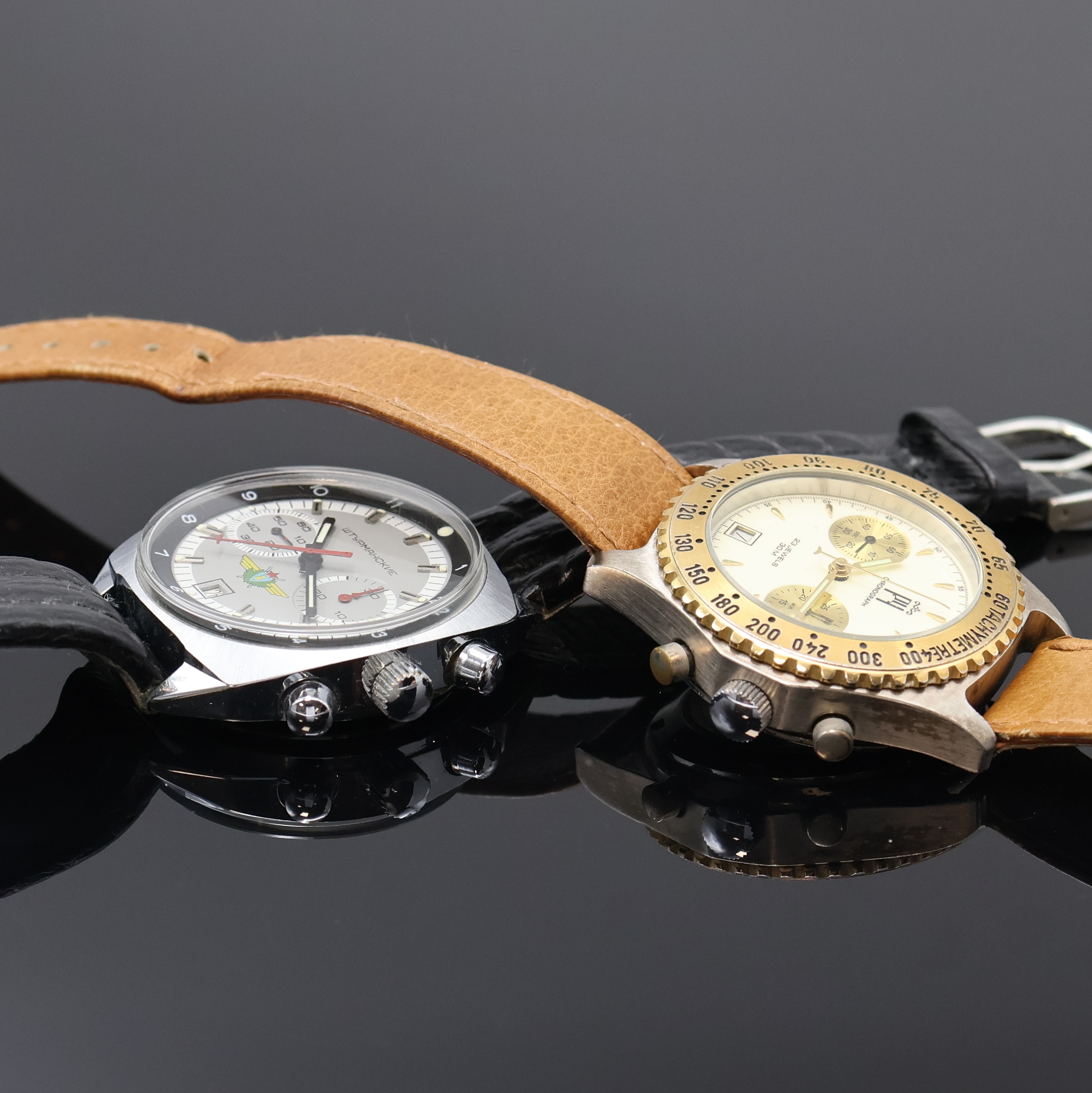 Detail g: 6 Russische Armbanduhren, Russland um 1980- 2010, Handaufzug/Automatik, 4 Chronographen, 2 Armbanduhren, Stahl/vergoldete Geh., Böden verschr. u. ...