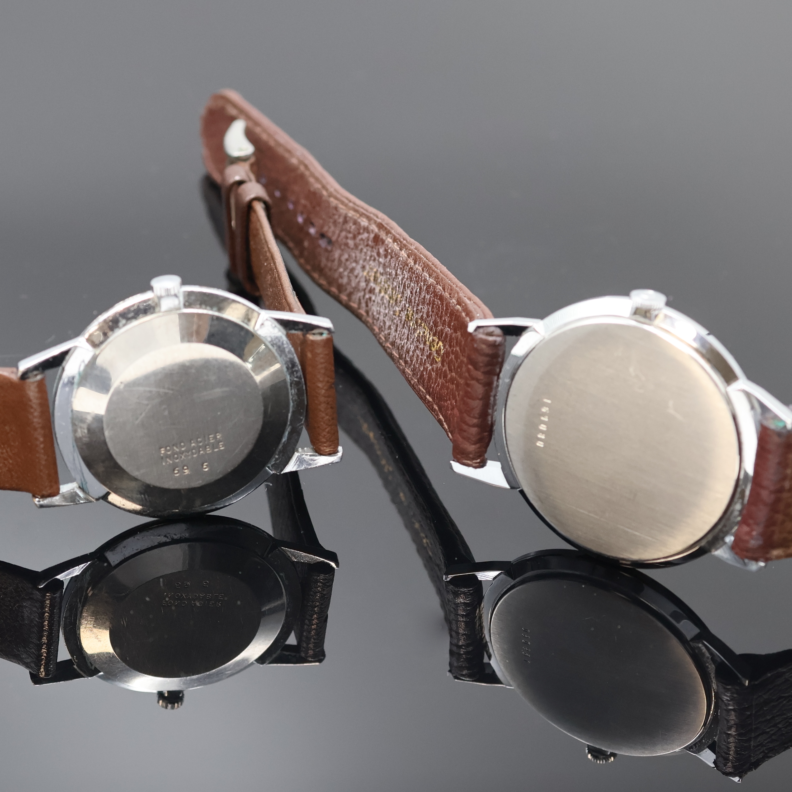 Detail d: ADRIA, ELECTION, DULFI, ESTIMA und ARCADIA 5 Armbanduhren, Schweiz um 1960, Handaufzug/Automatik, verchr./Edelstahlgeh., Böden verschr. u. gedr., ...