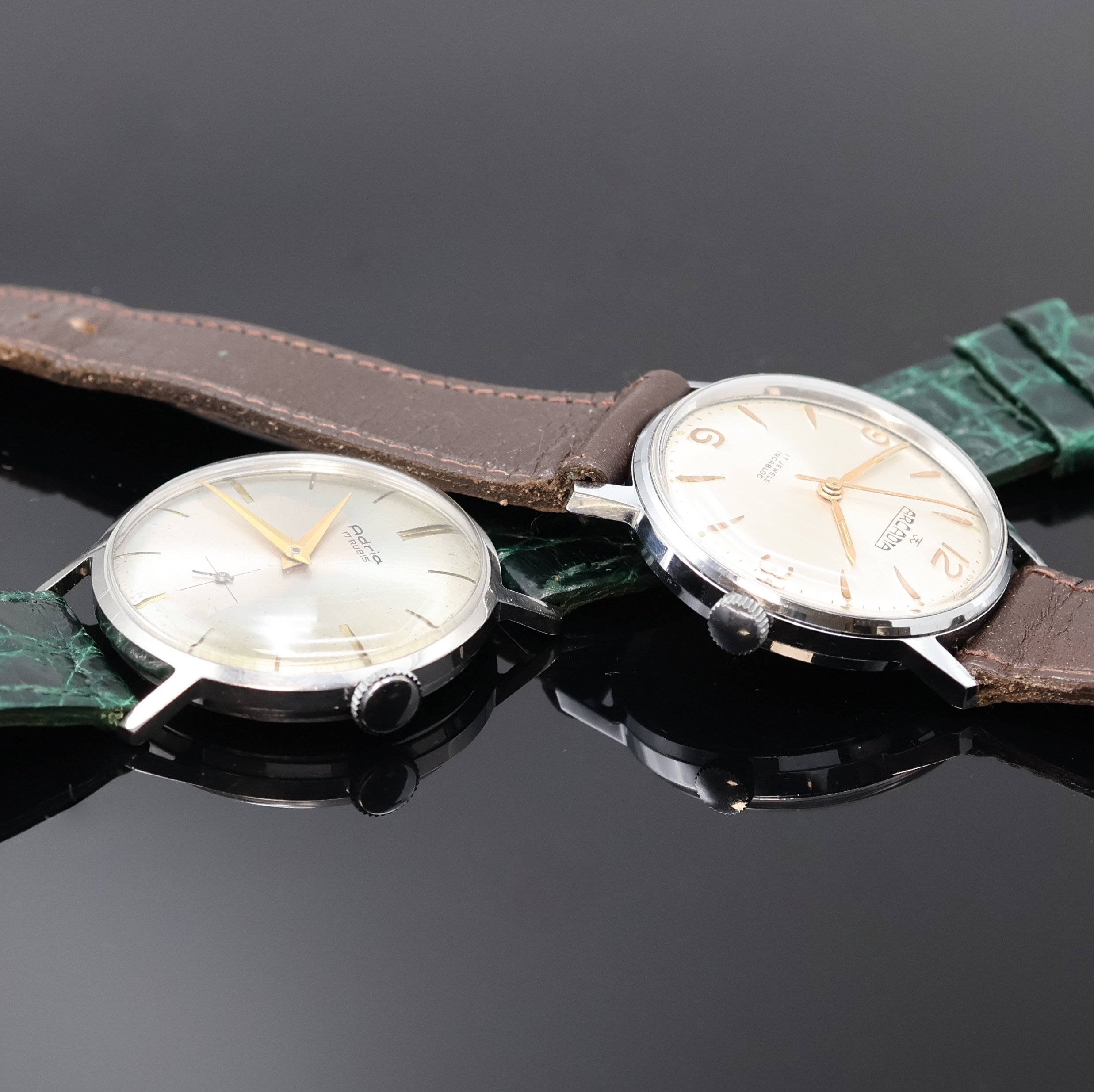 Detail e: ADRIA, ELECTION, DULFI, ESTIMA und ARCADIA 5 Armbanduhren, Schweiz um 1960, Handaufzug/Automatik, verchr./Edelstahlgeh., Böden verschr. u. gedr., ...