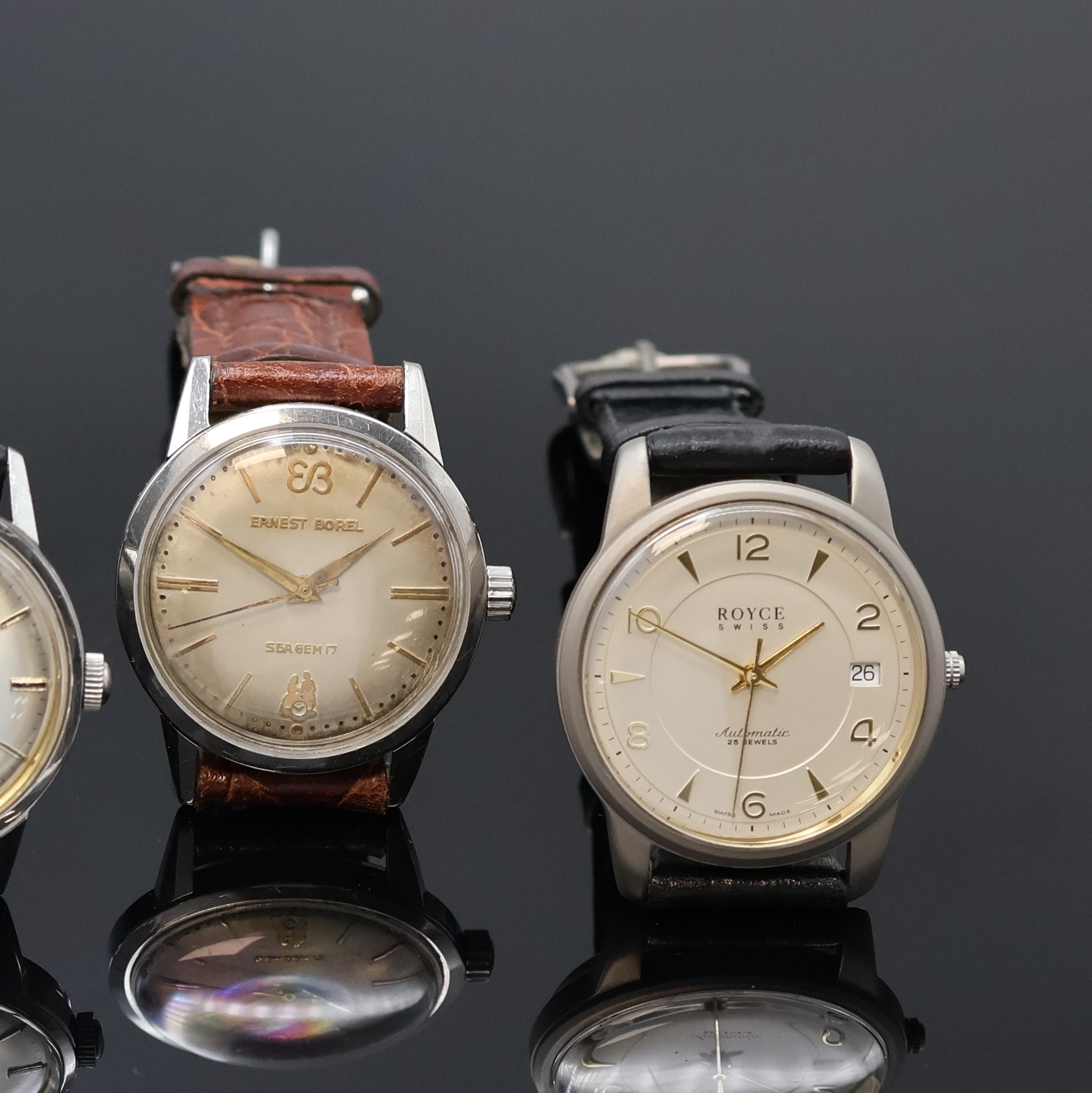 Detail b: ROYCE, BERGANA, ROYAL, DOXA und ERNEST BOREL 5 Armbanduhren, Schweiz um 1960-2000, Handaufzug u. Automatik, verchr./Stahl u. Titan, Böden verschr. ...