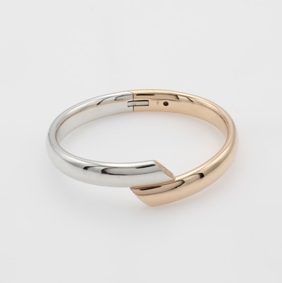 27003377a - Armspange, WG/RG 585/000, gegenläufig gearb., abgeschrägte Enden, B. ca. 9.5 mm