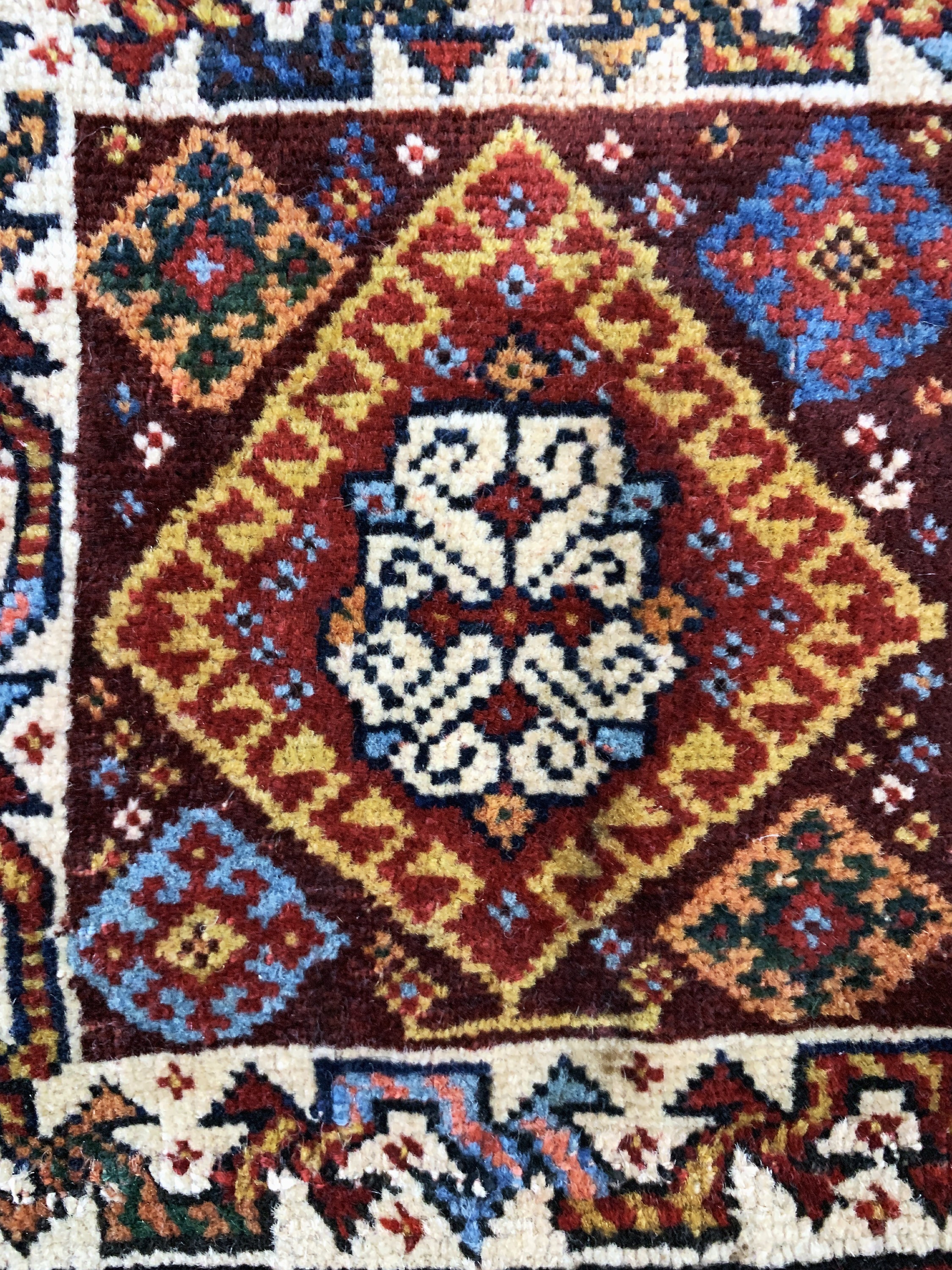 Detail b: Ghaschgai Tasche, Persien, um 1900, Wolle auf Wolle, ca. 26 x 24 cm, EHZ: 2(restauriert).