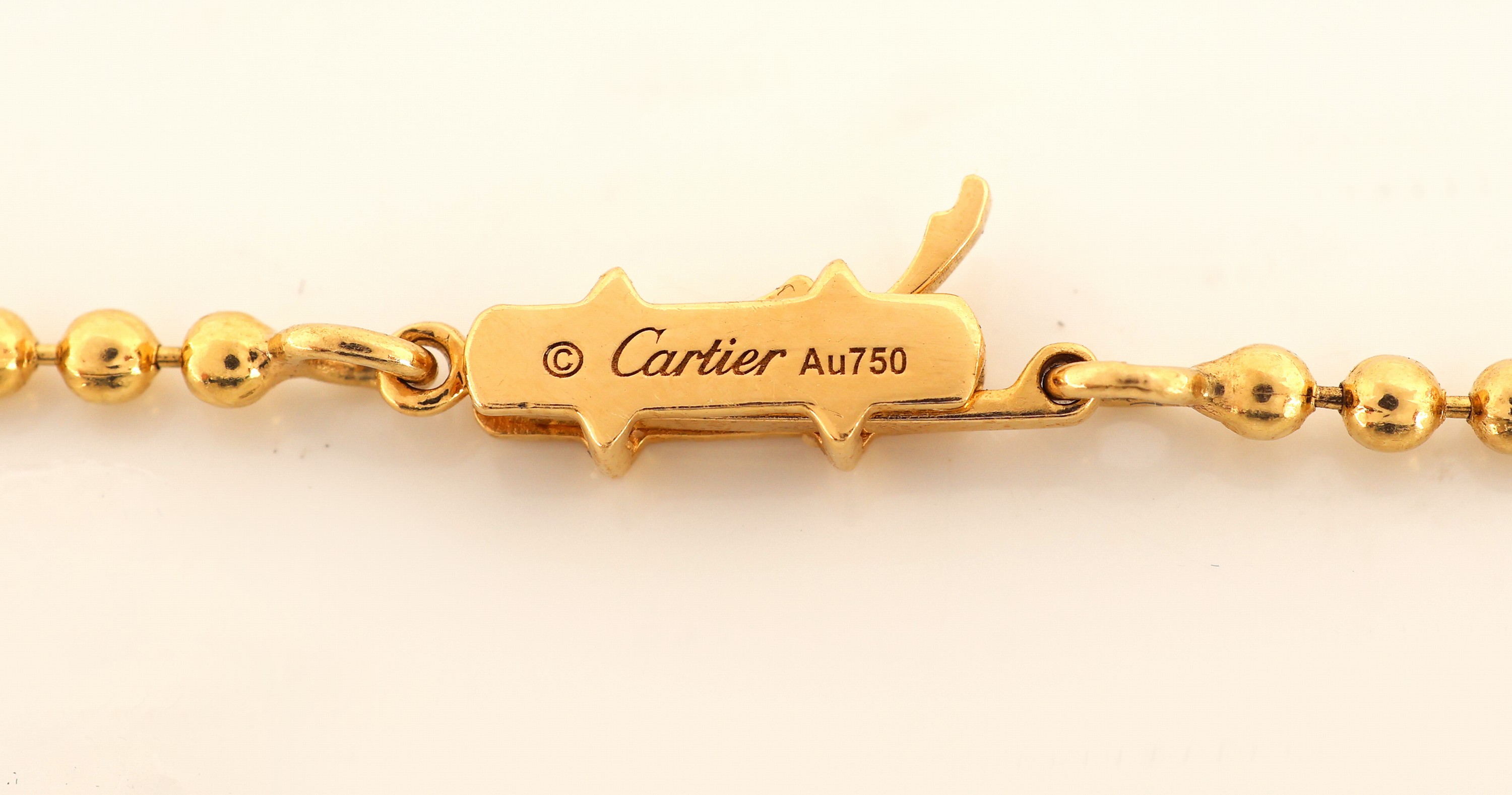 Detail d: 18 kt Gold PANTHERE DE CARTIER Citrin- Brillant-Anhänger, GG 750/000, Darstellung eines Panthers, Fell part. mit schwarzem Hartlack, gr. facett. ...