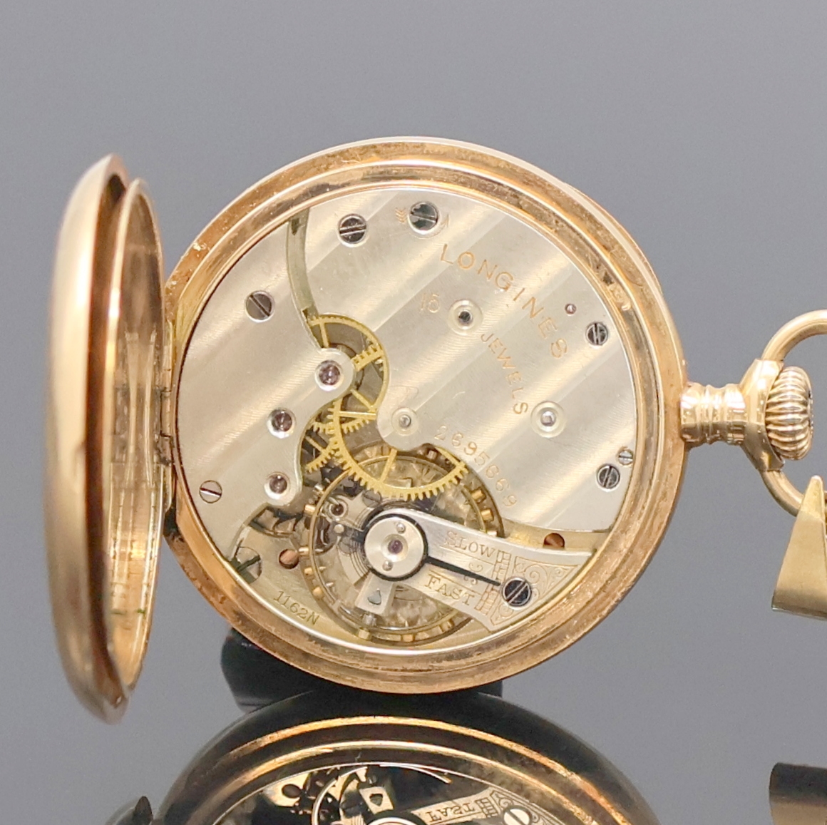 Detail d: LONGINES offene Damentaschenuhr in RG 585/000, Schweiz um 1912, glattes 2-Deckel Goldgeh. m. gekürztem Scharnier, grav. Monogramm auf Rückdeckel, ...