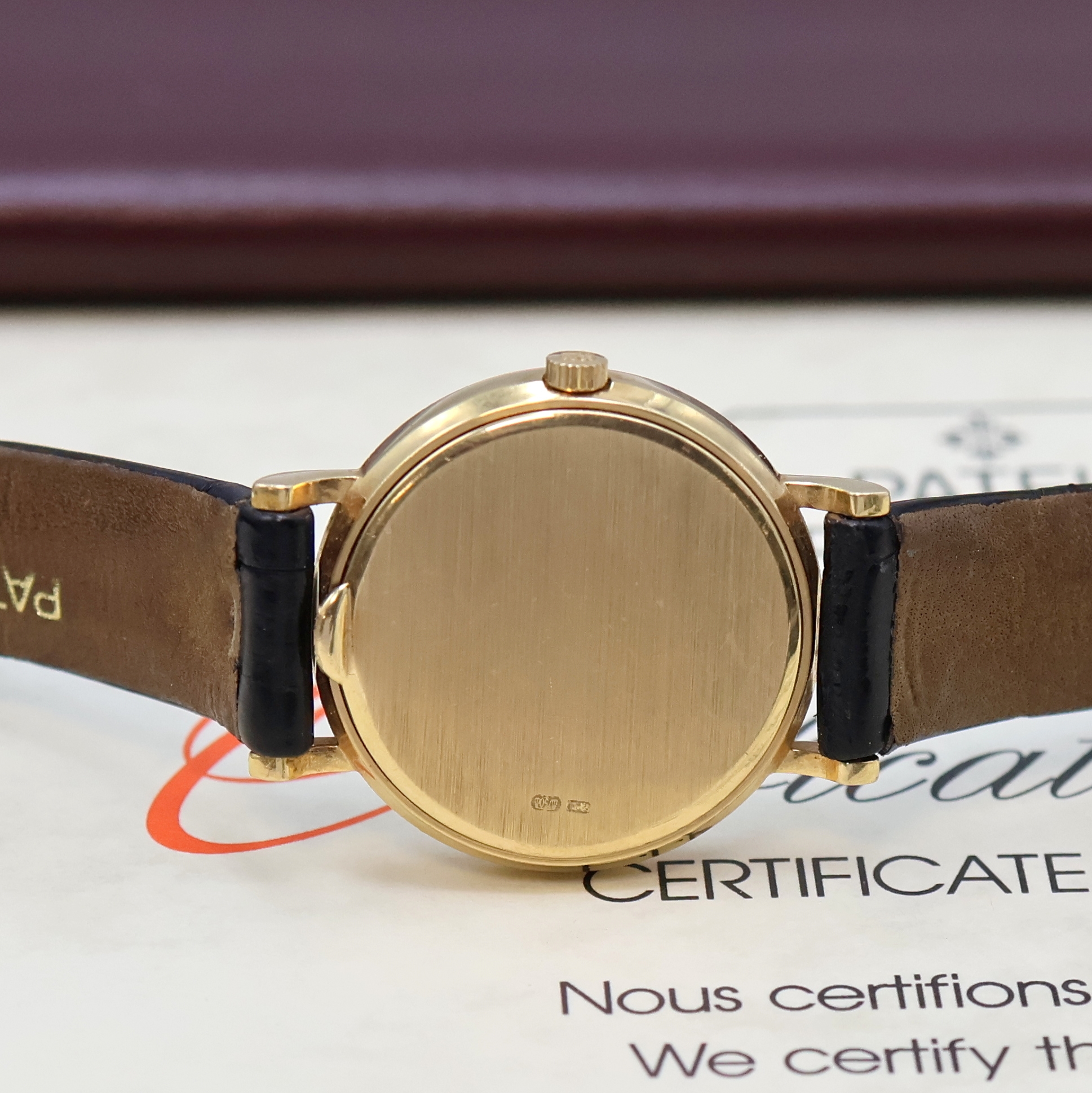 Detail d: PATEK PHILIPPE Damenarmbanduhr Serie Calatrava in GG 750/000 Referenz 4819, 2-teil. Geh. inkl. orig. Lederband m. orig. GG 750/000 Dornschl., Boden ...