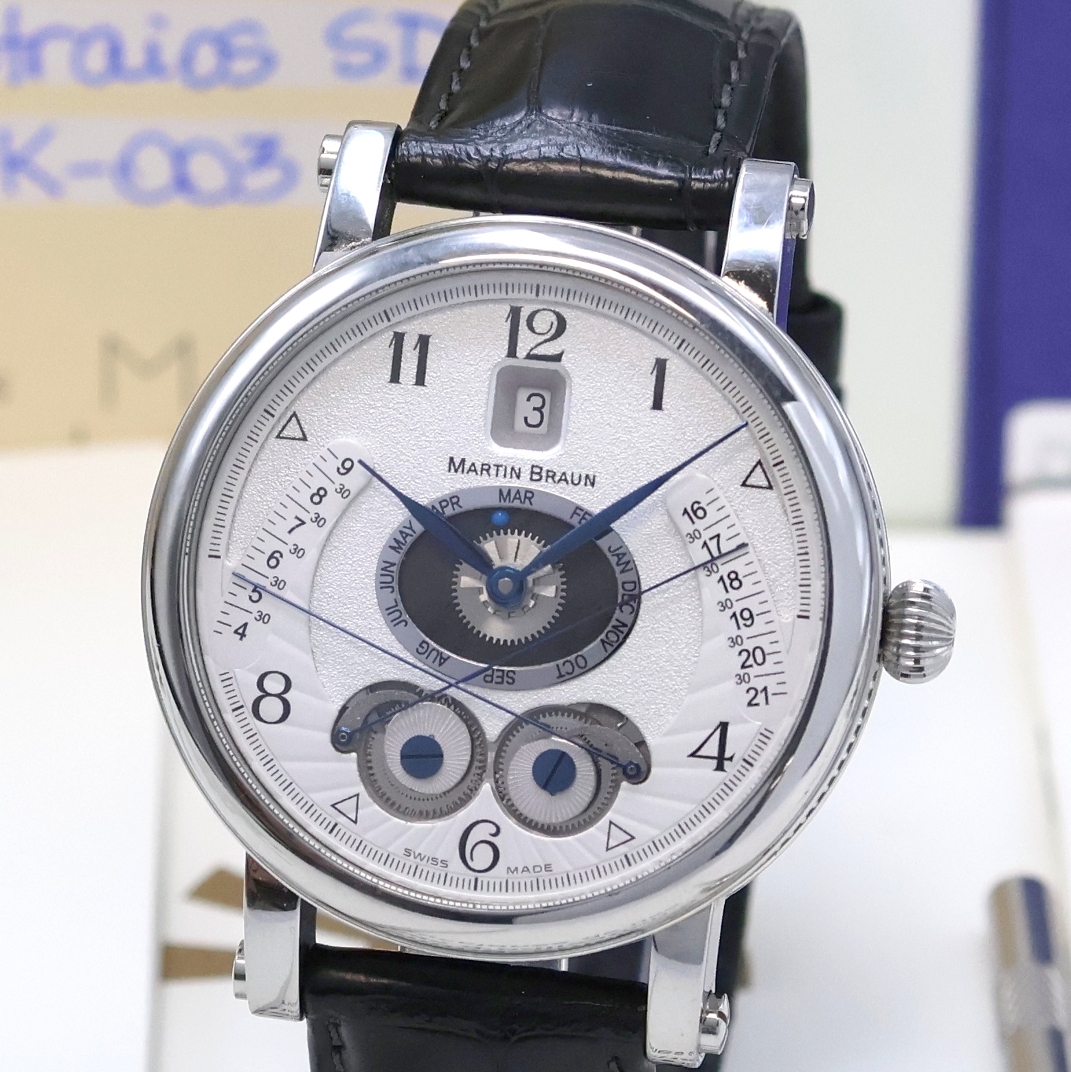 Detail a: MARTIN BRAUN astronomische Herrenarmbanduhr Astraios/S Referenz K-003, Schweiz um 2008, Automatik, Edelstahlgeh. inkl. orig. Lederband m. orig. ...