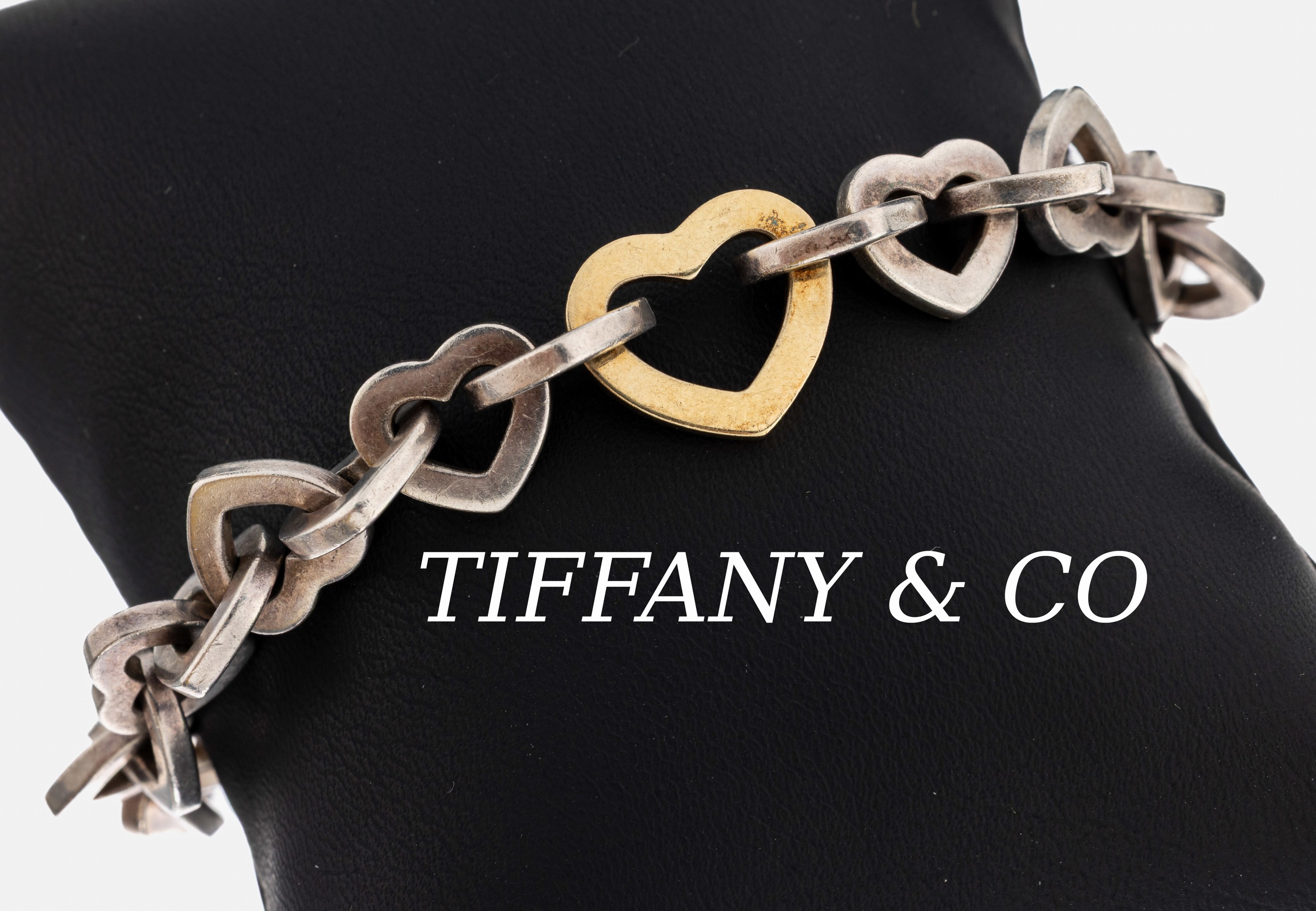 Image 27005747 - TIFFANY & CO Armband, 925er Silber, herzf. Glieder, 1 Glied GG 750/000, L. ca. 19 cm, ...