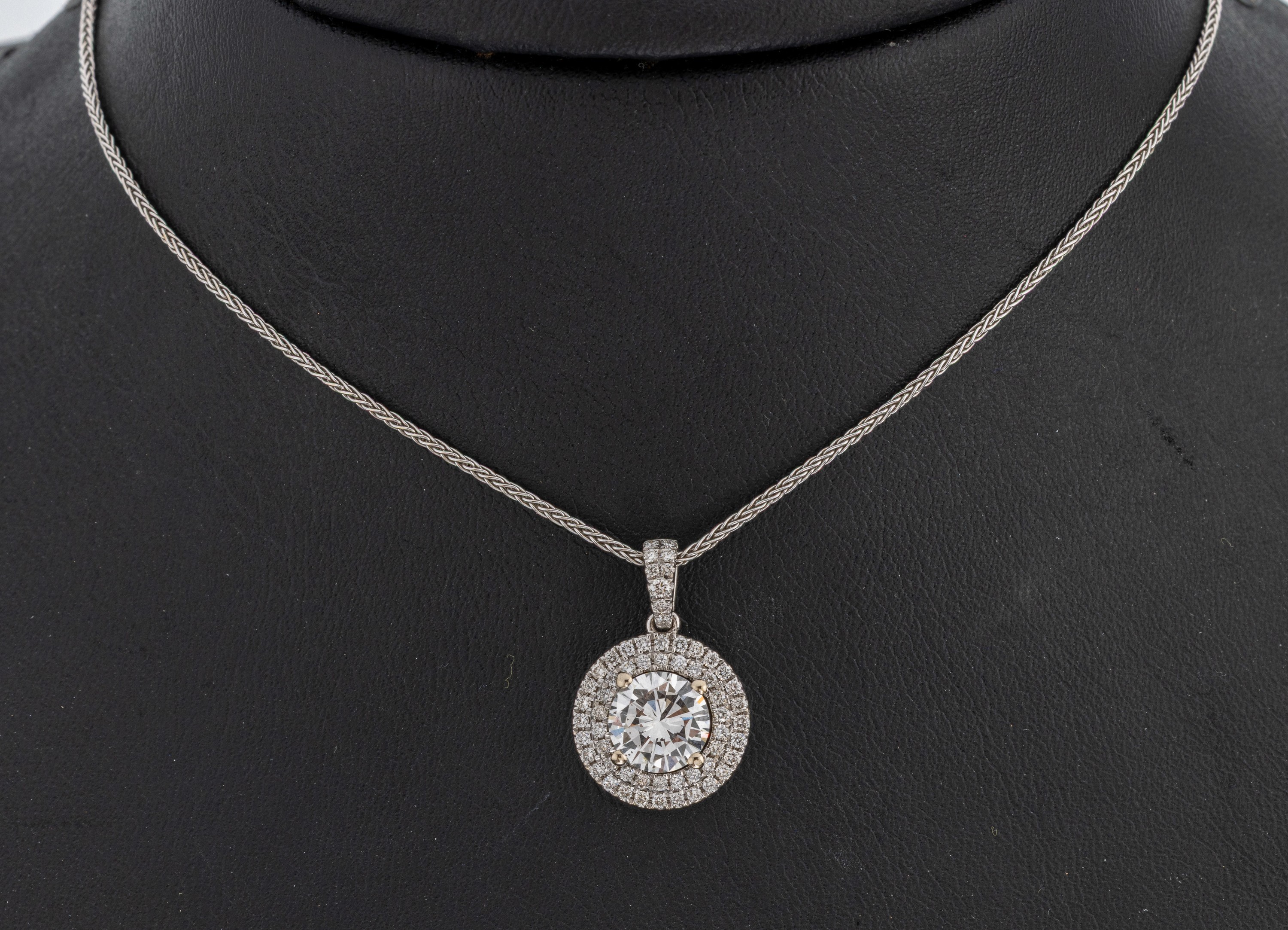 Image 27005774 - 18 kt Gold Brillant-Anhänger, WG 750/000, mittig erhaben gefasster Brillant ca. 1.37 ...