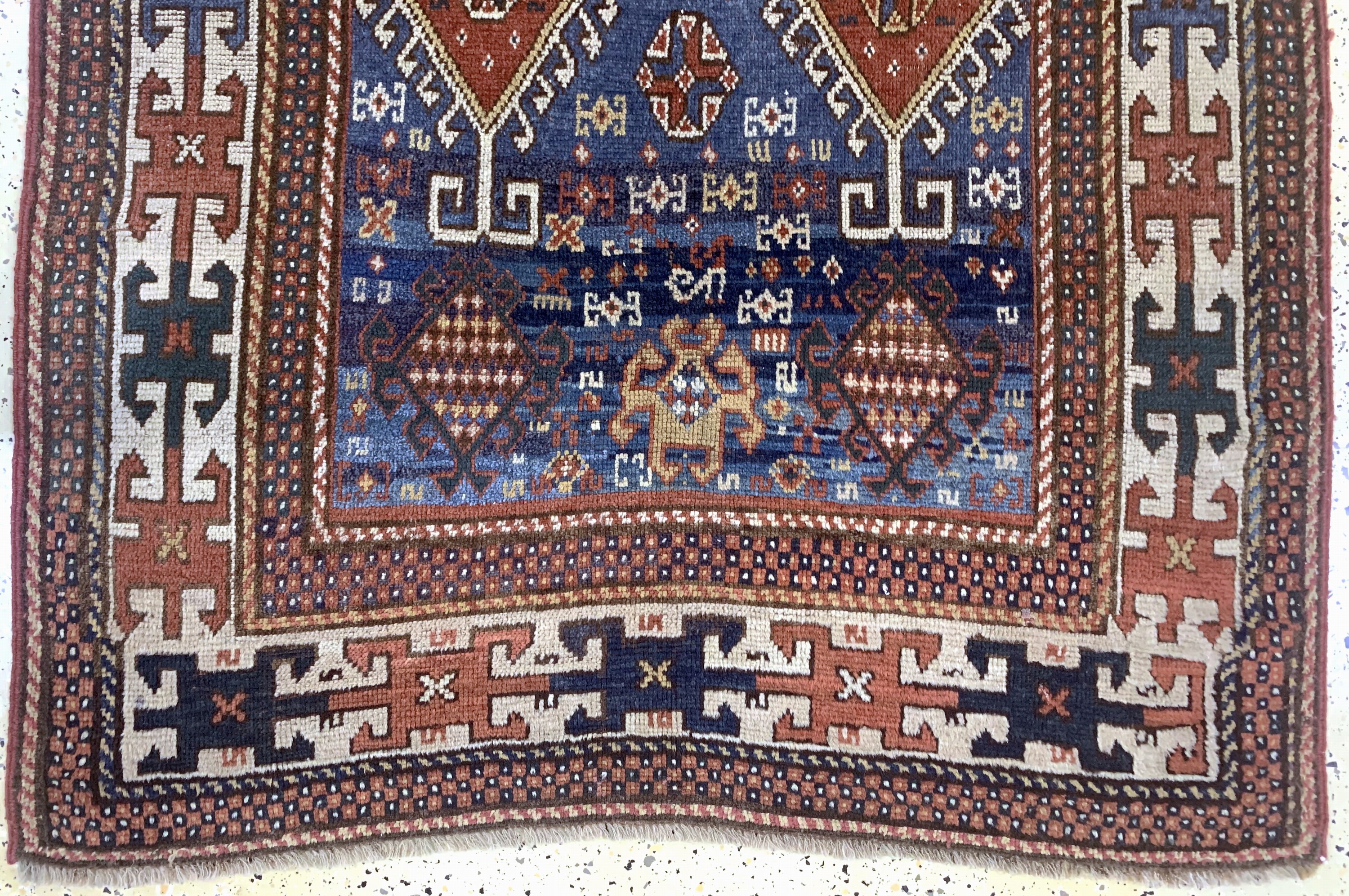 Detail c: Antiker Kazak, Kaukasus, 19.Jhd, Wolle auf Wolle, ca. 220 x 120 cm, EHZ:(gleichmäßig dünn), restauriert
