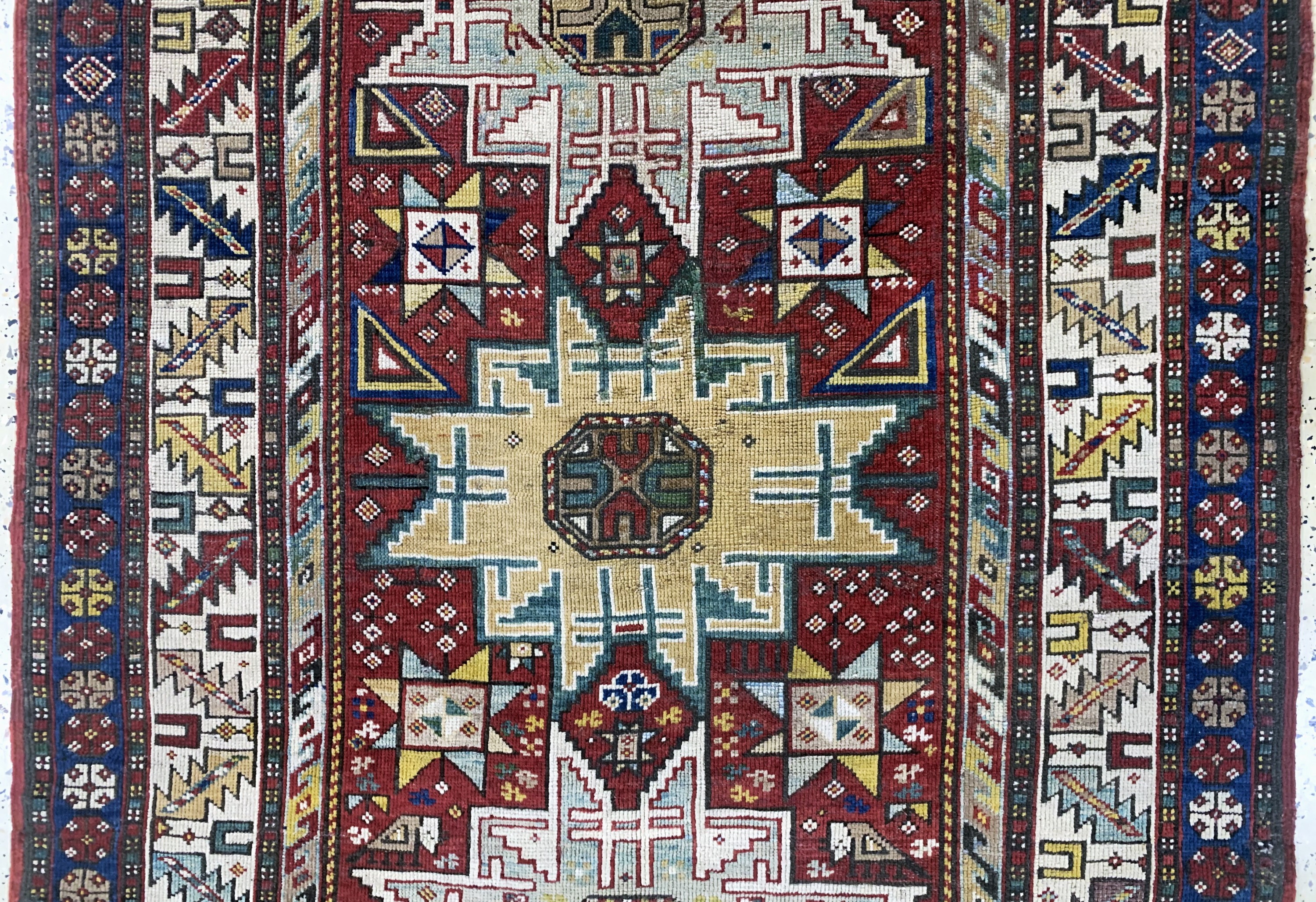 Detail b: Antiker Kazak, Kaukasus, 19.Jhd, Wolle auf Wolle, ca. 205 x 124 cm, EHZ:(gleichmäßig dünn), restauriert
