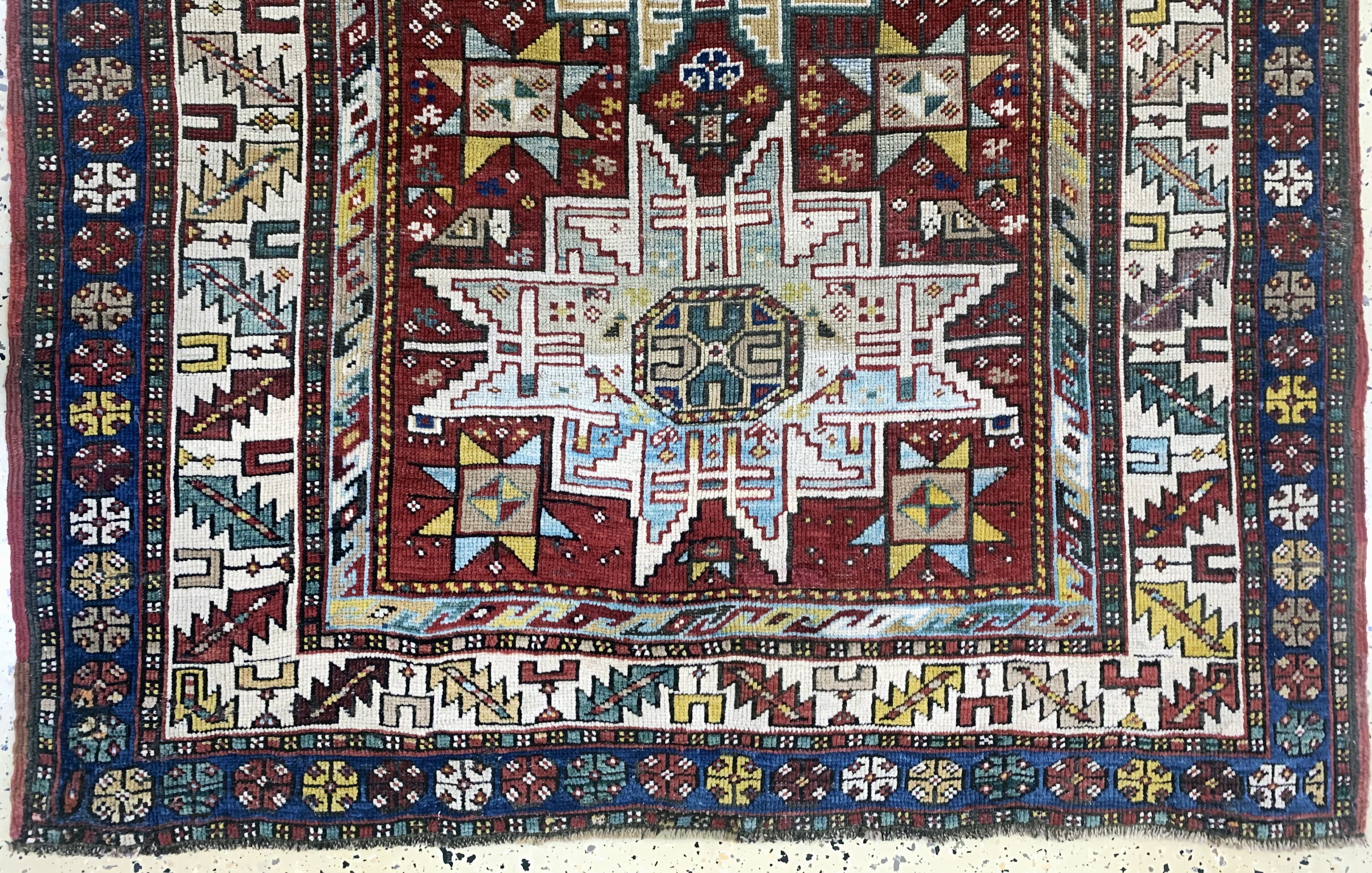 Detail c: Antiker Kazak, Kaukasus, 19.Jhd, Wolle auf Wolle, ca. 205 x 124 cm, EHZ:(gleichmäßig dünn), restauriert