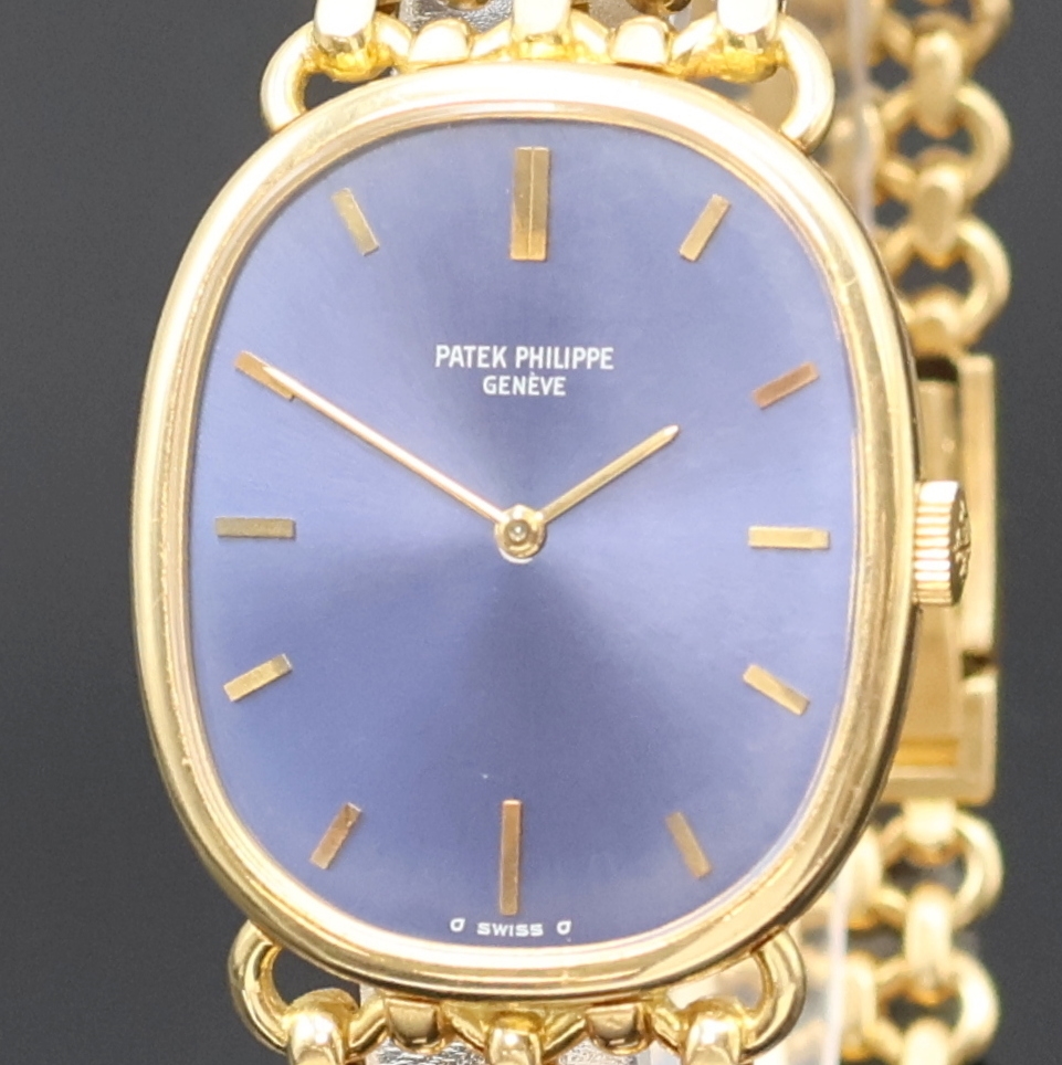 Detail a: PATEK PHILIPPE Ellipse Armbanduhr in GG 750/000 Referenz 3848/1, Schweiz um 1980, Handaufzug, ovales 3-tlg. Geh., orig. Goldband, Boden u. Glasrand ...