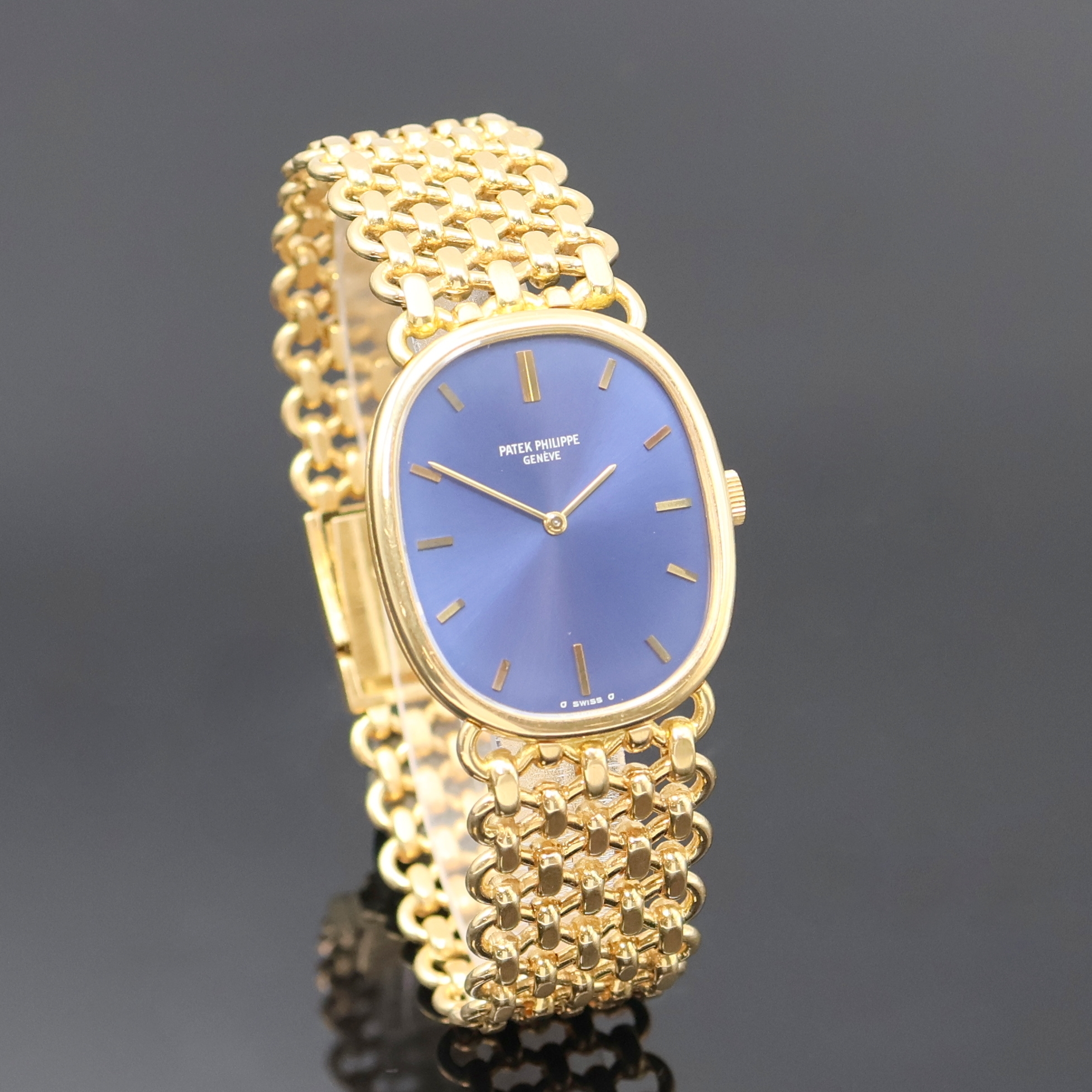 Detail b: PATEK PHILIPPE Ellipse Armbanduhr in GG 750/000 Referenz 3848/1, Schweiz um 1980, Handaufzug, ovales 3-tlg. Geh., orig. Goldband, Boden u. Glasrand ...
