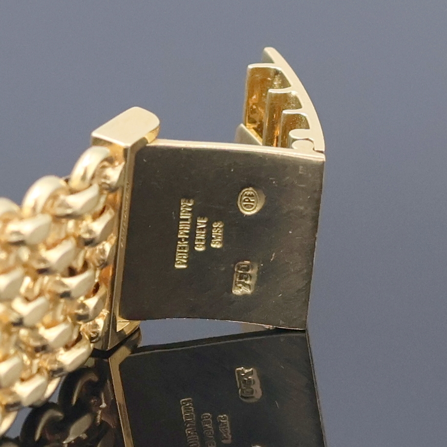 Detail d: PATEK PHILIPPE Ellipse Armbanduhr in GG 750/000 Referenz 3848/1, Schweiz um 1980, Handaufzug, ovales 3-tlg. Geh., orig. Goldband, Boden u. Glasrand ...