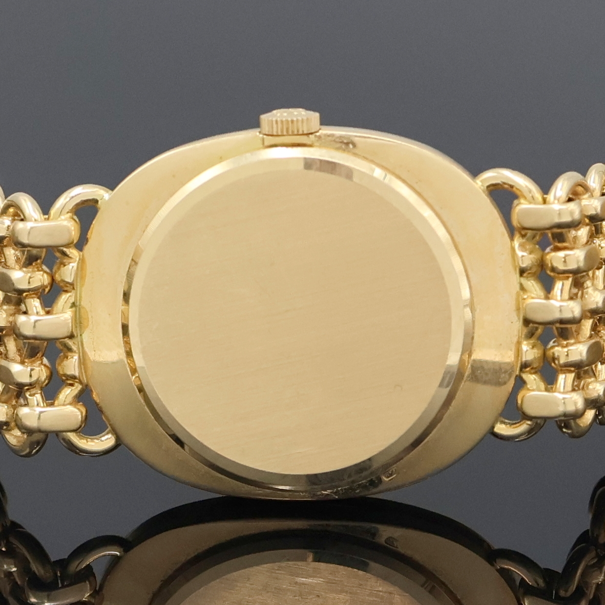 Detail f: PATEK PHILIPPE Ellipse Armbanduhr in GG 750/000 Referenz 3848/1, Schweiz um 1980, Handaufzug, ovales 3-tlg. Geh., orig. Goldband, Boden u. Glasrand ...