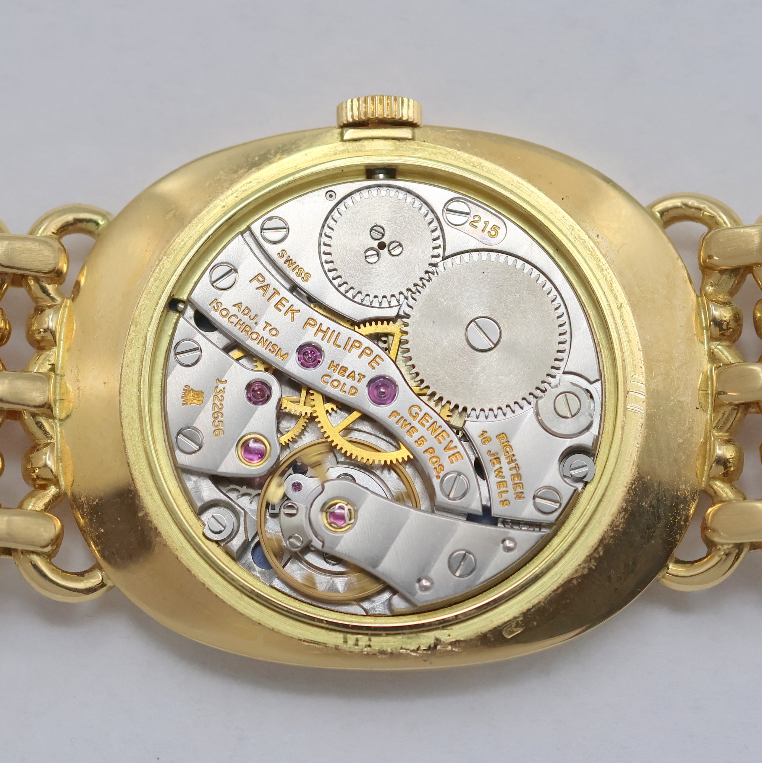 Detail g: PATEK PHILIPPE Ellipse Armbanduhr in GG 750/000 Referenz 3848/1, Schweiz um 1980, Handaufzug, ovales 3-tlg. Geh., orig. Goldband, Boden u. Glasrand ...