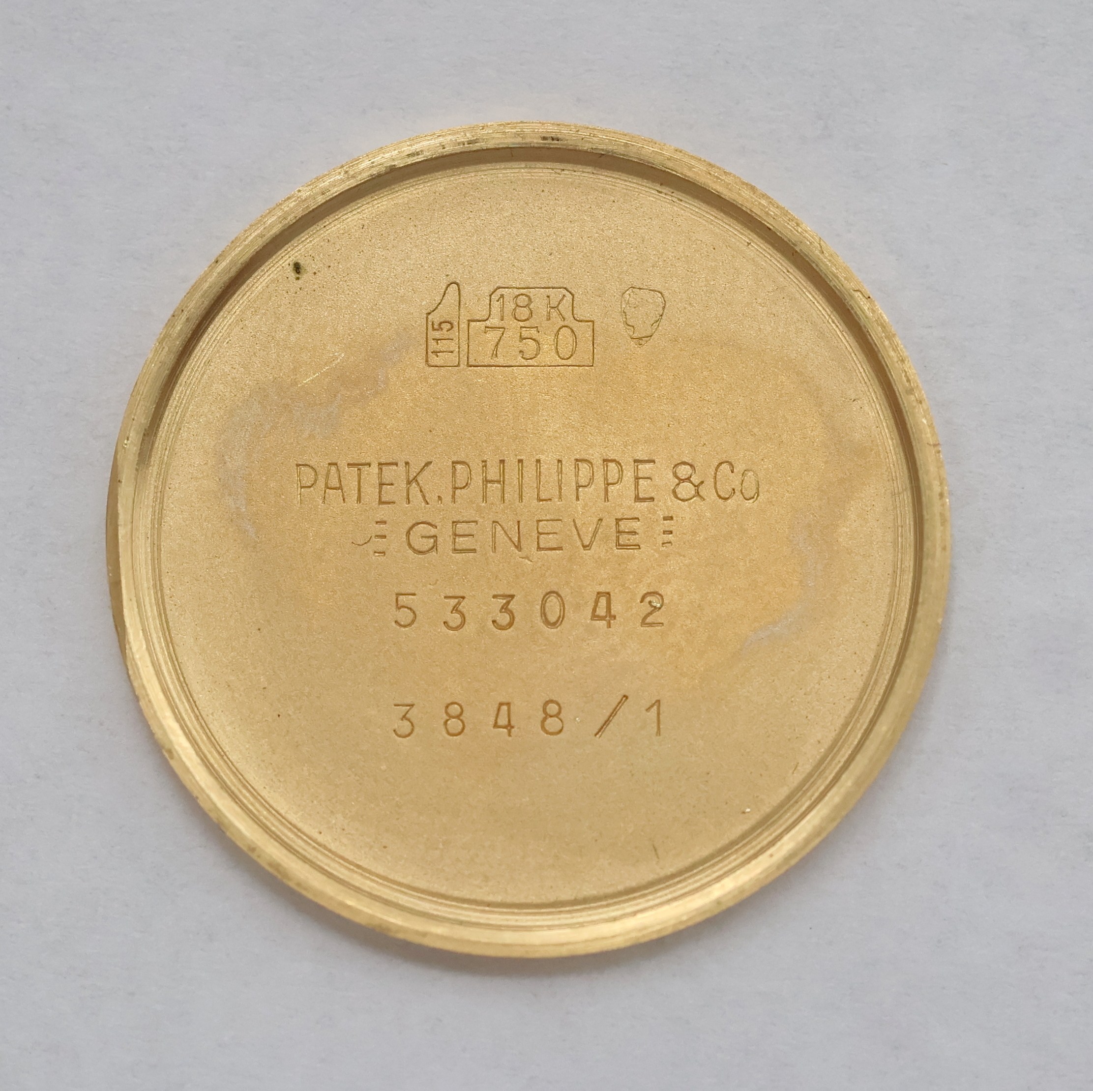 Detail h: PATEK PHILIPPE Ellipse Armbanduhr in GG 750/000 Referenz 3848/1, Schweiz um 1980, Handaufzug, ovales 3-tlg. Geh., orig. Goldband, Boden u. Glasrand ...