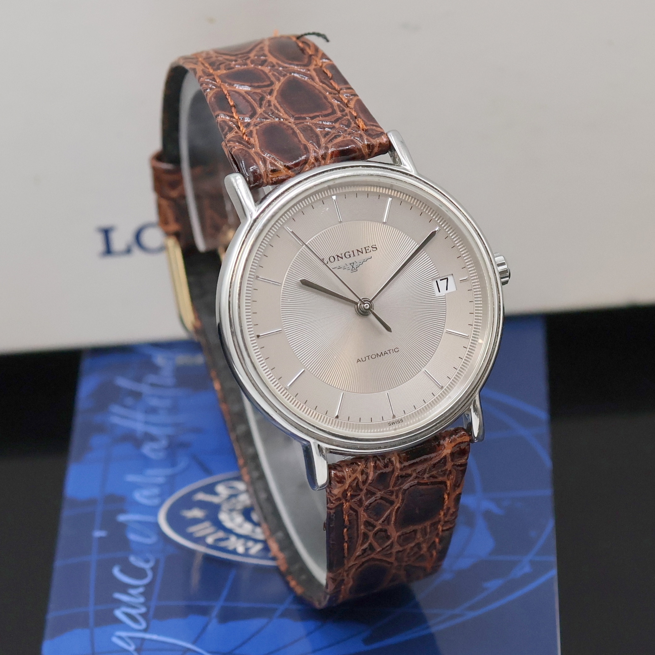 Detail b: LONGINES Presence Armbanduhr Referenz L4.721.4, Schweiz verk. lt. beil. Pap. 06/2004, Automatik, Edelstahlgeh., Boden aufgedr., silb. Zifferbl. ...