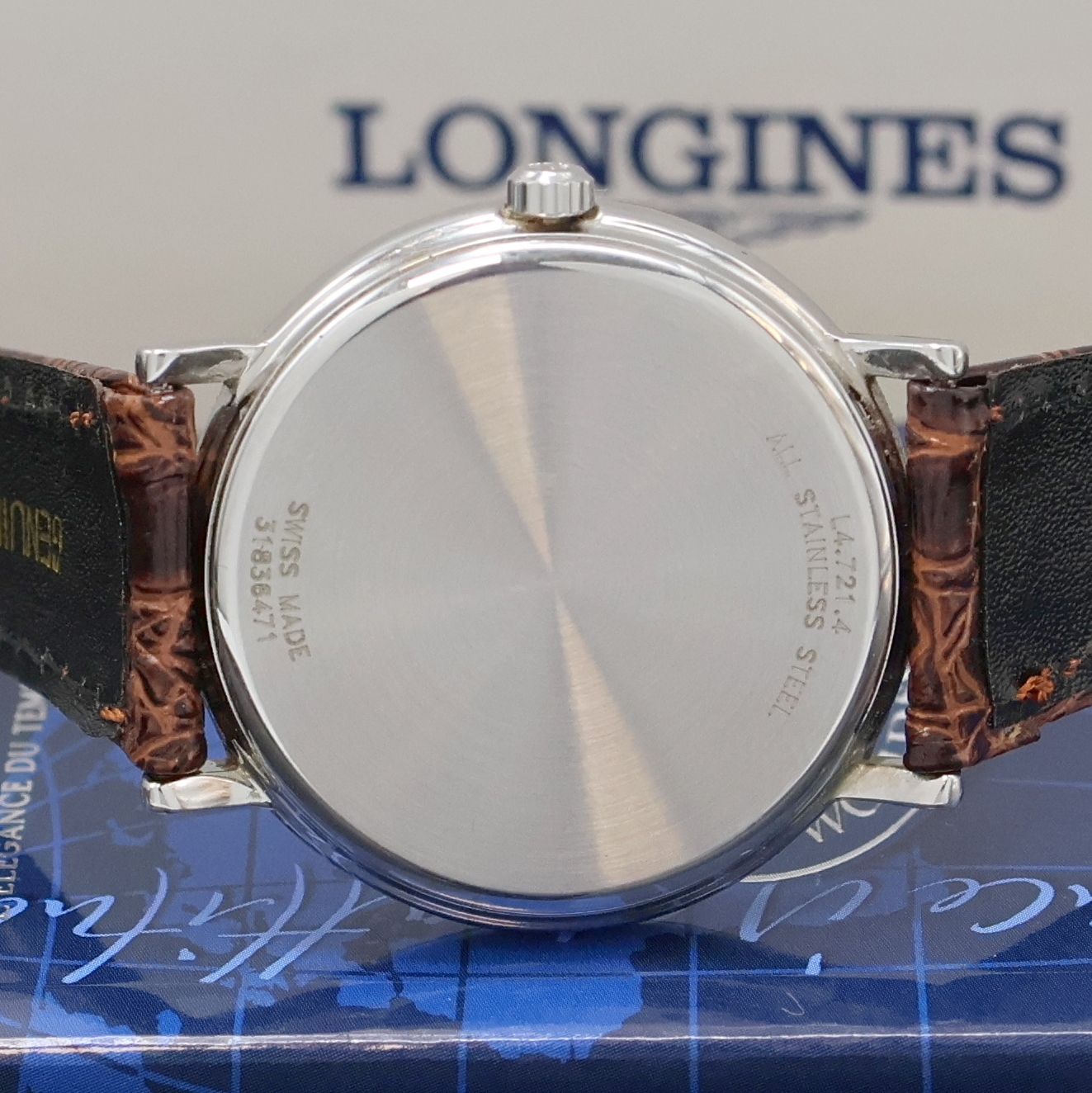 Detail d: LONGINES Presence Armbanduhr Referenz L4.721.4, Schweiz verk. lt. beil. Pap. 06/2004, Automatik, Edelstahlgeh., Boden aufgedr., silb. Zifferbl. ...
