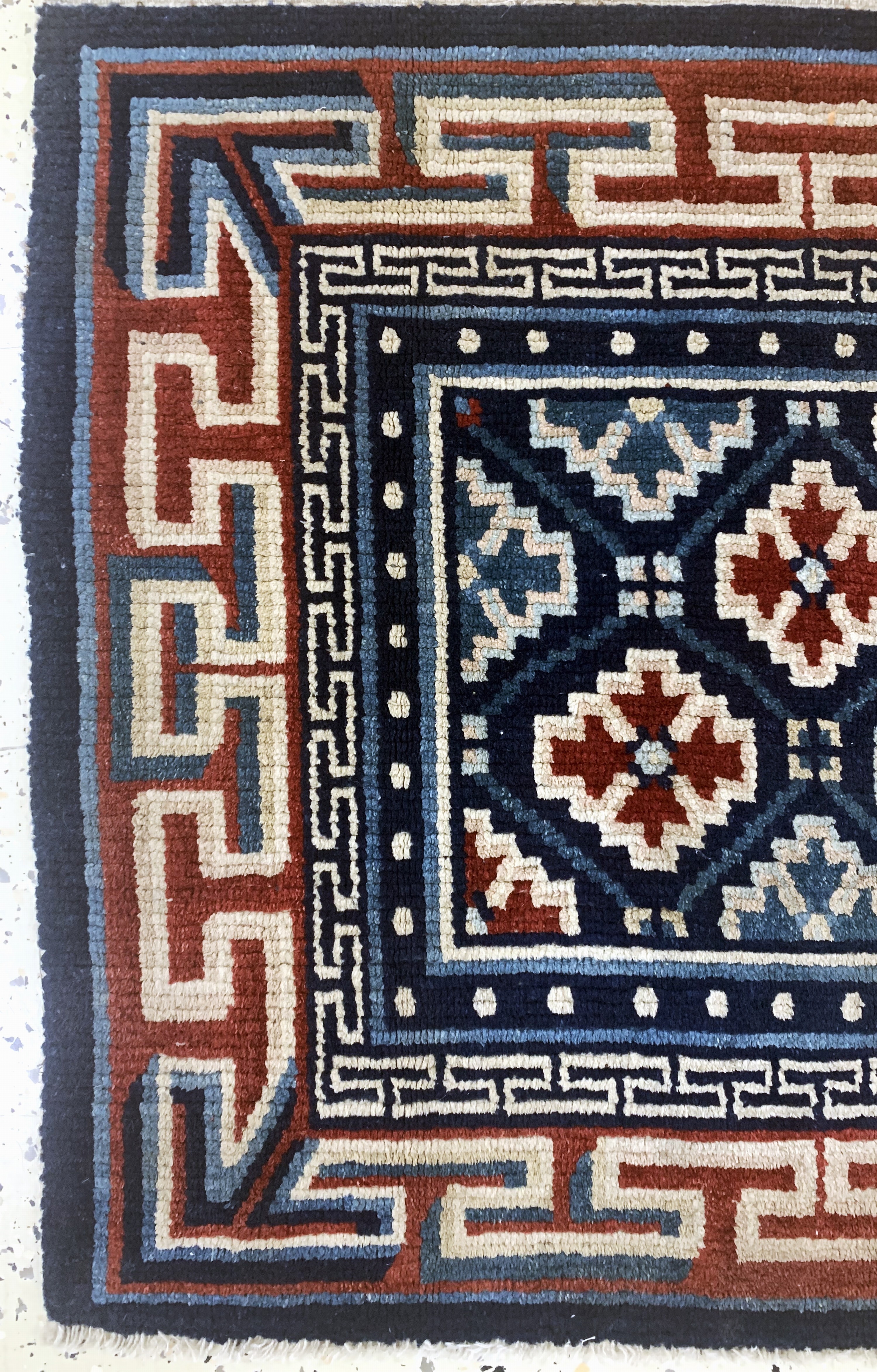 Detail b: Gyantse"Sitzmatte"alt, Tibet, um 1920, Wolle auf Wolle, ca. 68 x 80 cm, EHZ: 2