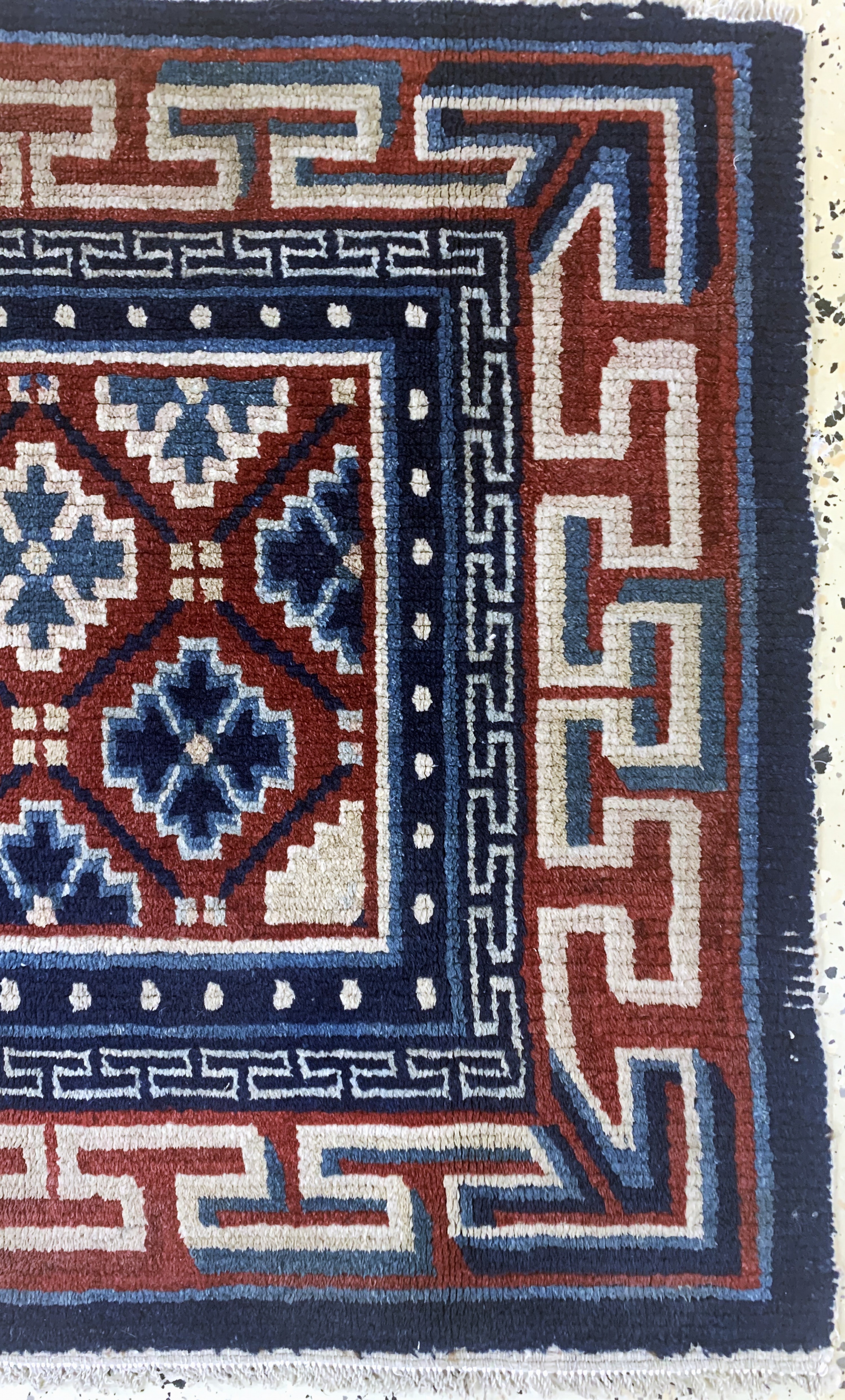 Detail a: Gyantse"Sitzmatte"alt, Tibet, um 1920, Wolle auf Wolle, ca. 70 x 78 cm, EHZ: 2