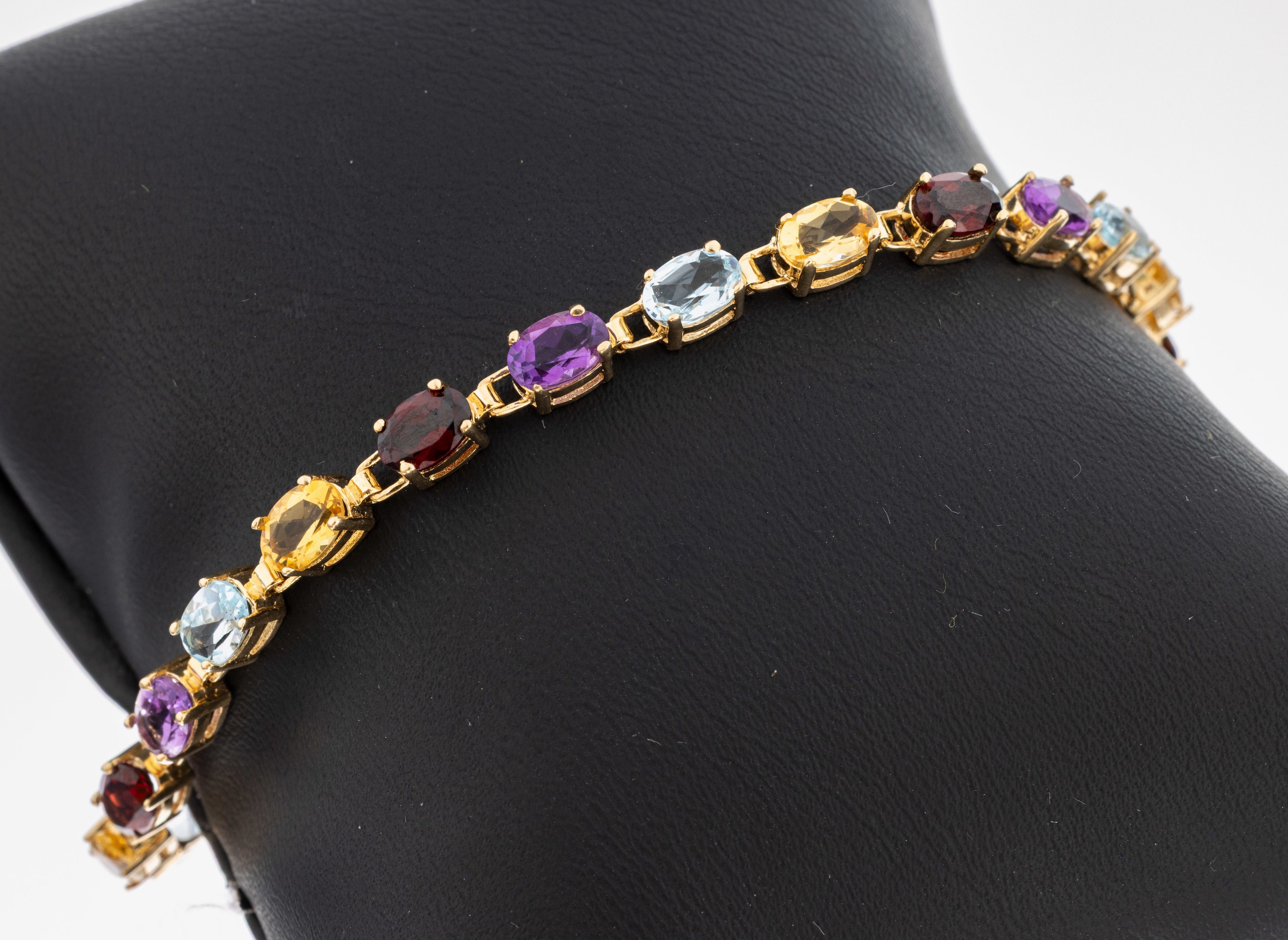 Image 27010520 - 14 kt Gold Farbstein-Armband, GG 585/000, 22 ovalfacett. Farbsteine, Amethyst, Granat, ...