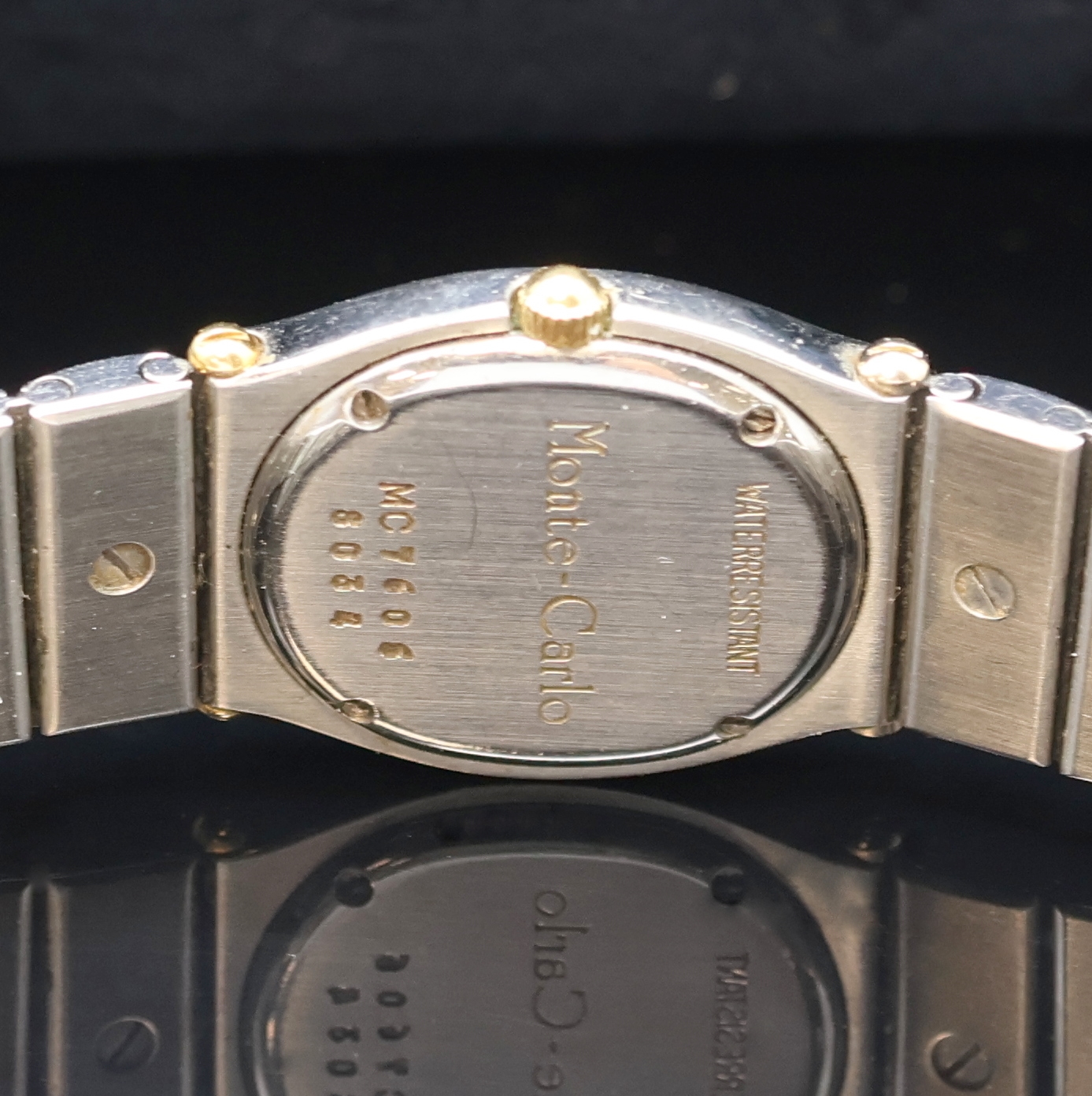 Detail e: CHOPARD Damenarmbanduhr Monte-Carlo Referenz 8034, Schweiz um 1995, quarz, Edelstahl/Gold kombiniert inkl. Gliederband m. dopp. Faltschließe, Boden ...