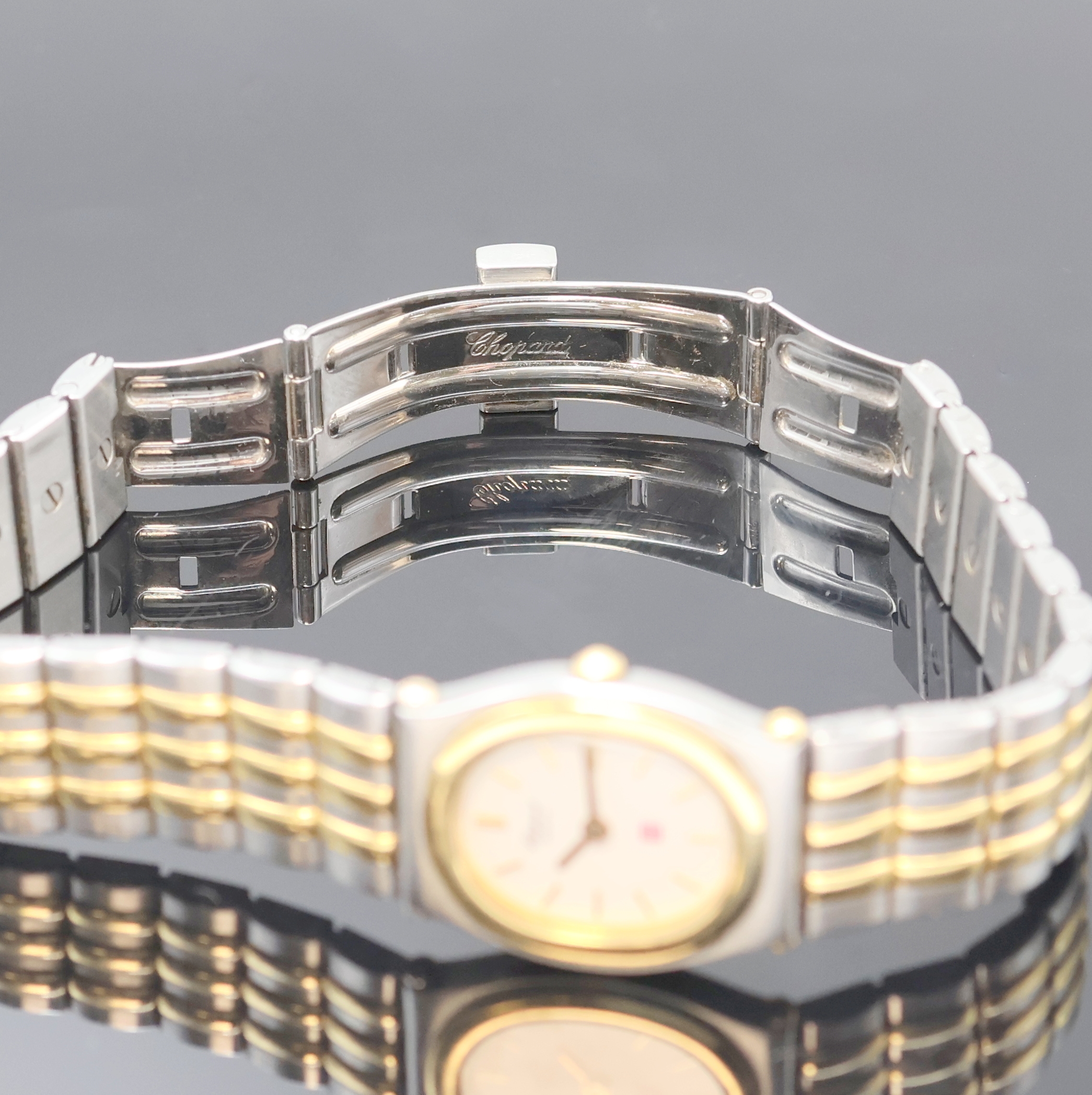 Detail f: CHOPARD Damenarmbanduhr Monte-Carlo Referenz 8034, Schweiz um 1995, quarz, Edelstahl/Gold kombiniert inkl. Gliederband m. dopp. Faltschließe, Boden ...