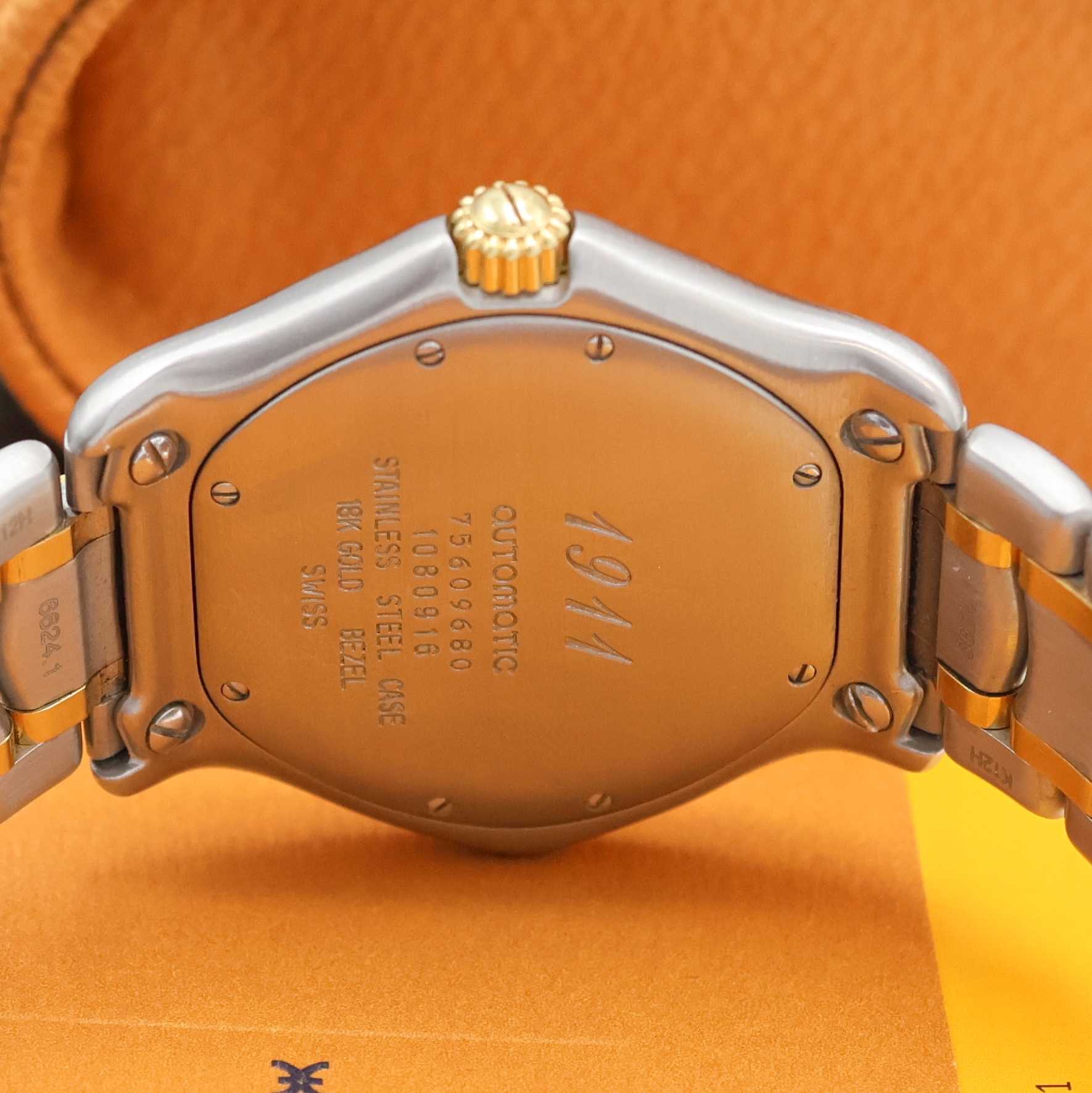 Detail e: EBEL 1911 Herrenarmbanduhr Referenz 1080916, Schweiz um 2005, Automatik, Edelstahl/Gold komb., Gliederband m. dopp. Faltschl., elfenbeinfarb. ...