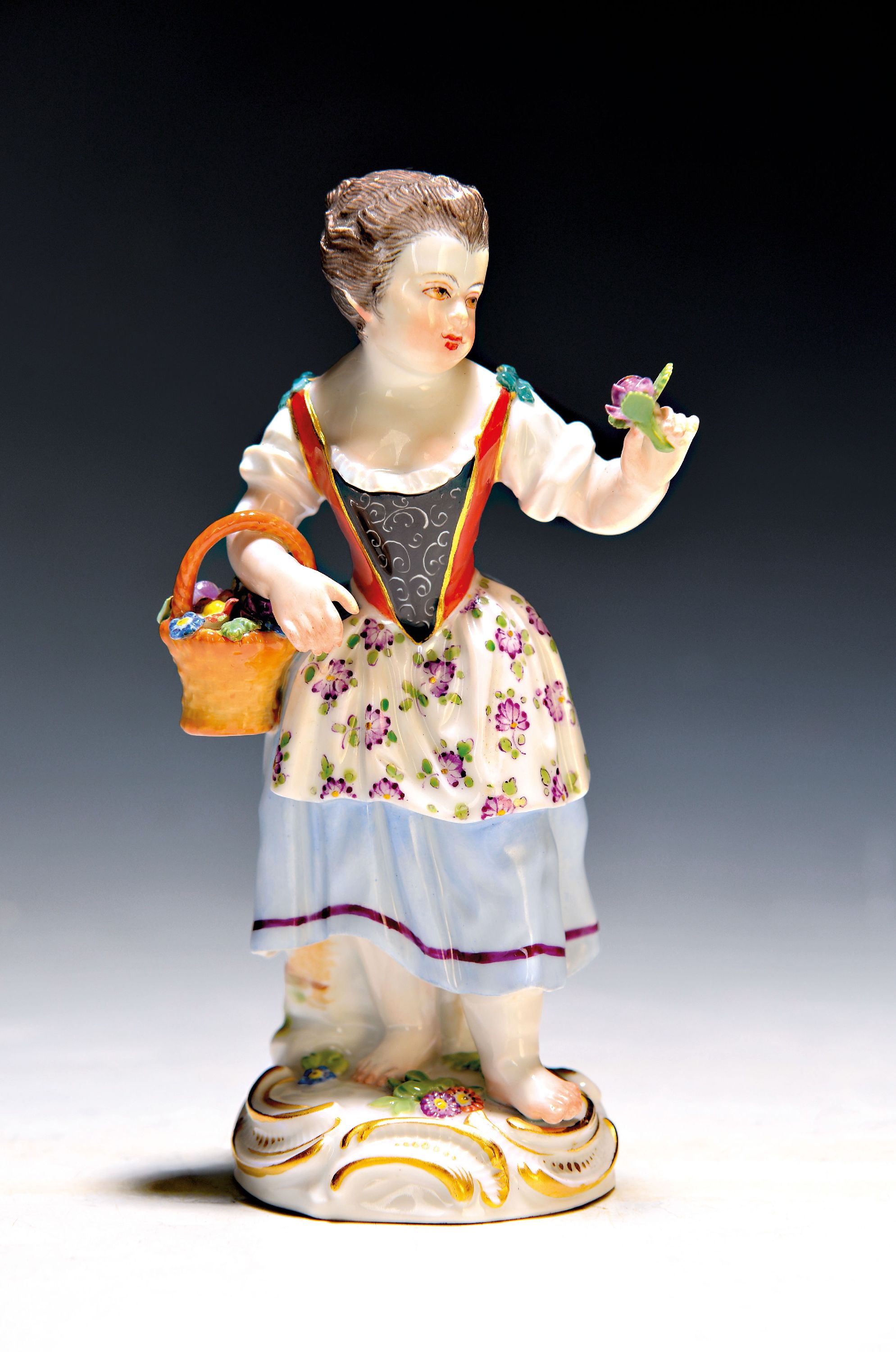 Porzellanfigur, Meissen, 20. Jh., Gärtnerin, bunt bemalt, H. ca. 14.5 cm