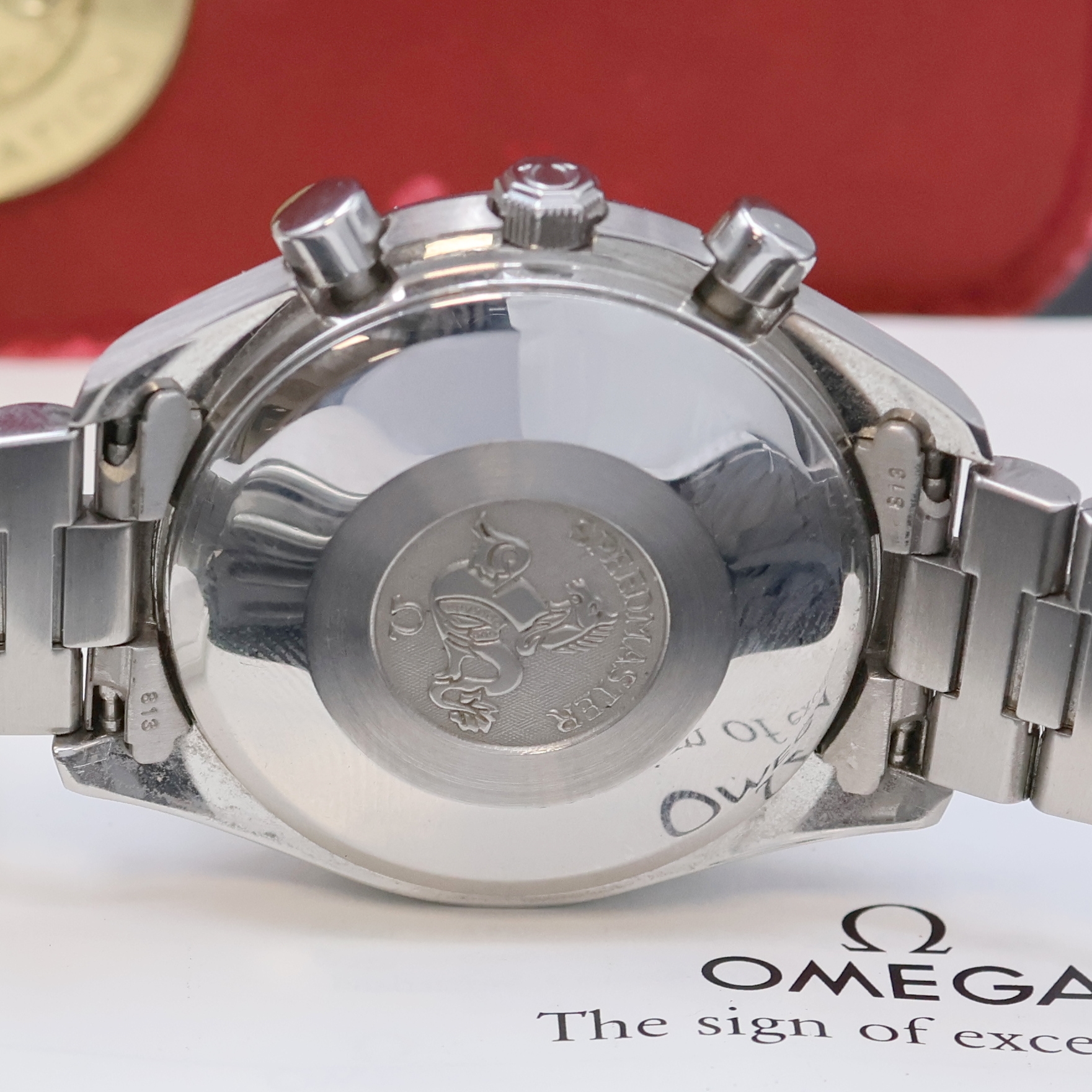 Detail e: OMEGA Speedmaster Armbandchronograph in Stahl Referenz 175.0044/375.0044, Schweiz verk. lt. beil. Pap. 12/1998, Automatik, Boden aufgedr., orig. ...