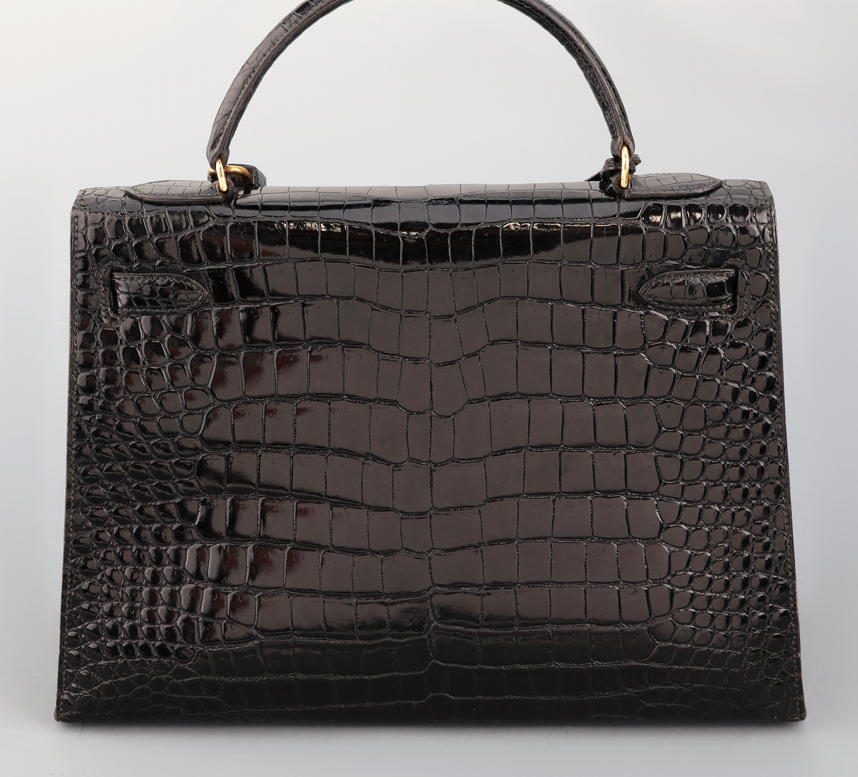 Detail d: HERMES Kelly Bag 32, Shiny Porosus Crocodile in Schwarz, 1978, Innenausstattung in feinem schwarzen Ziegenleder, Gold-Hardware, orig. Schloss mit ...