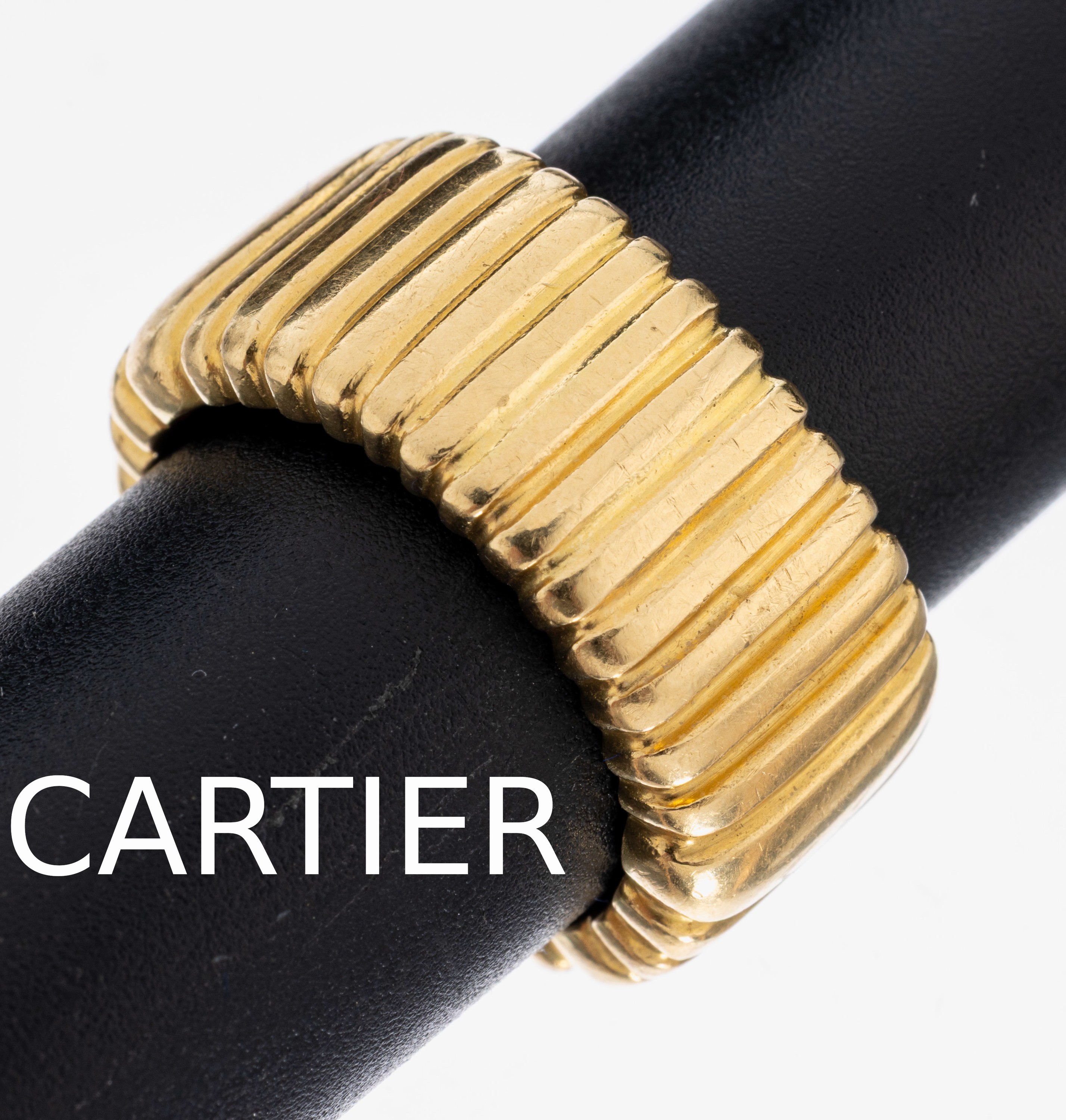 Image 27011737 - 18 kt Gold CARTIER Ring, GG 750/000, mehrfach gerillt, im Verlauf, RW 60, ca. 17.8 g, ...