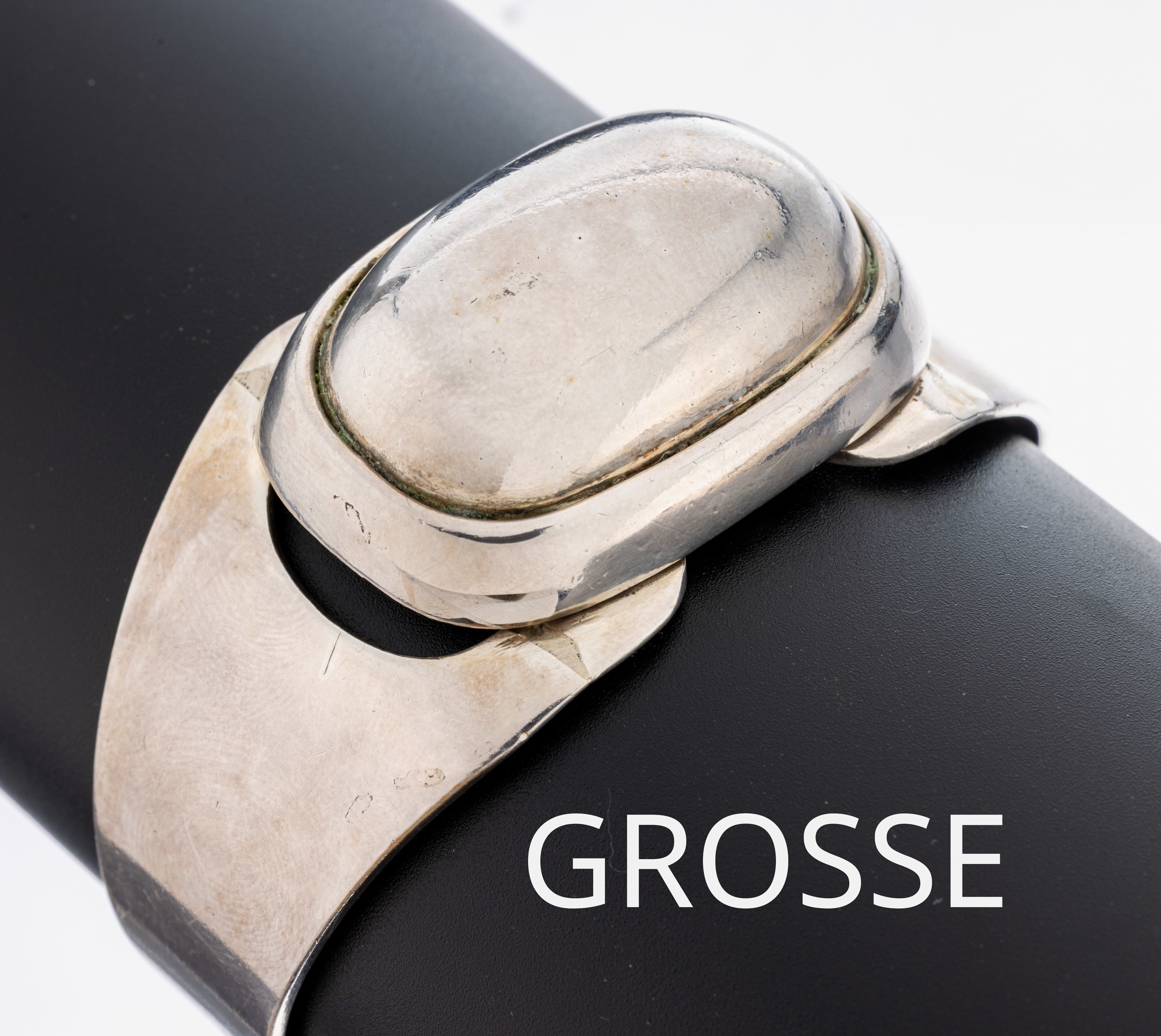 GROSSE Armspange, 1970er-80er Jahre, 925er Silber, schwere Verarbeitung, D. ca. 6 x 5 cm,offen gearbeitet, sign., ca. 77.3 g