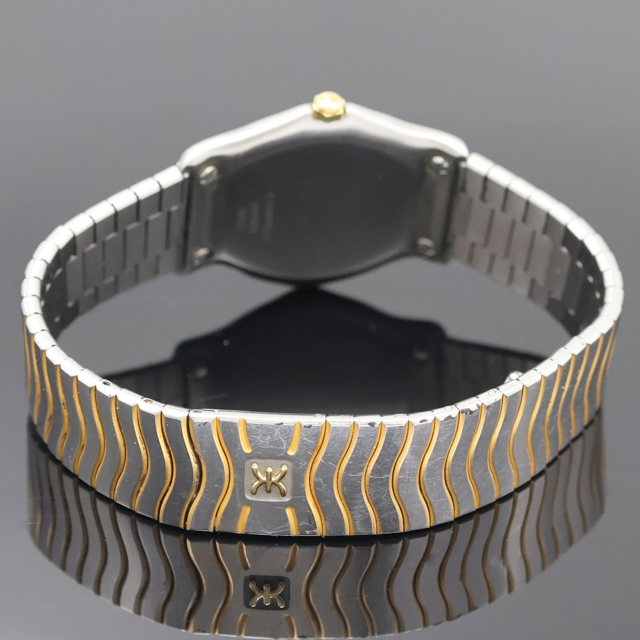 Detail c: EBEL Damenarmbanduhr Classic Wave Referenz 181909, Schweiz um 1980, quarz, Stahl/Gold kombiniert inkl. Wellengliederband m. Faltschl., Lünette gegen ...