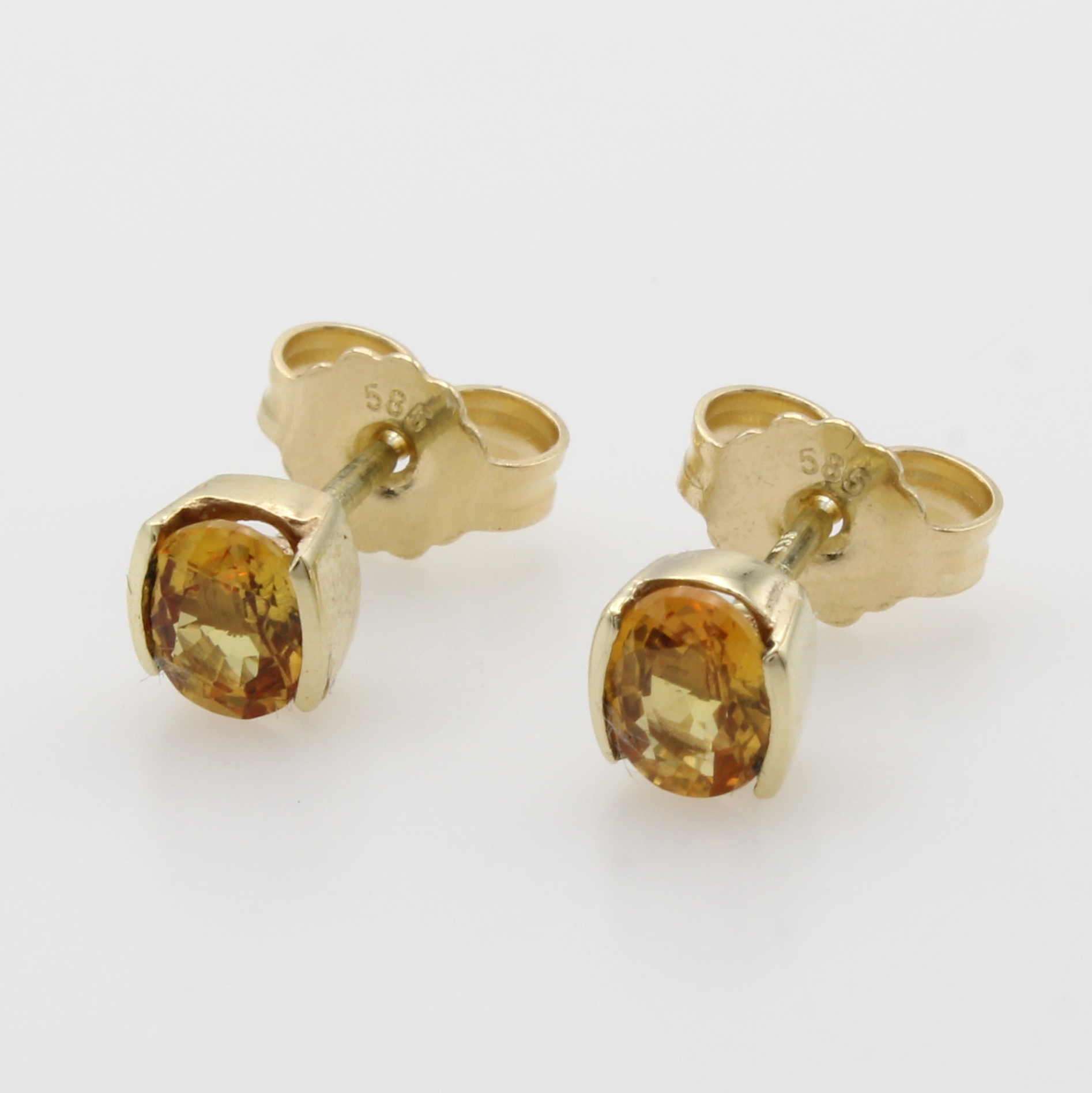 Image 27011819 - Paar Ohrstecker mit Saphiren, GG 585/000, 2 gelbe Saphire in Halbzargen gef. ...