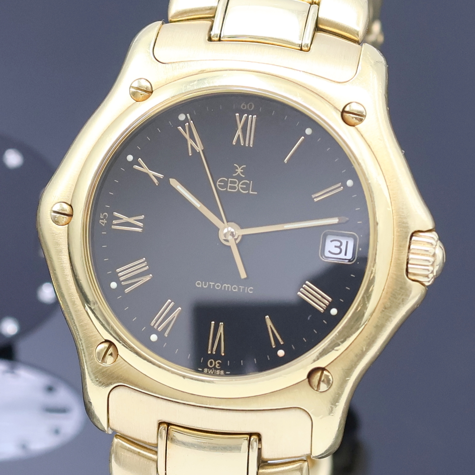 Detail a: EBEL 1911 Senior Herrenarmbanduhr in GG 750/000 Referenz 8080916, Schweiz um 1995, Automatik, massives Goldgeh. inkl. Gliederband m. Faltschl., zus. ...
