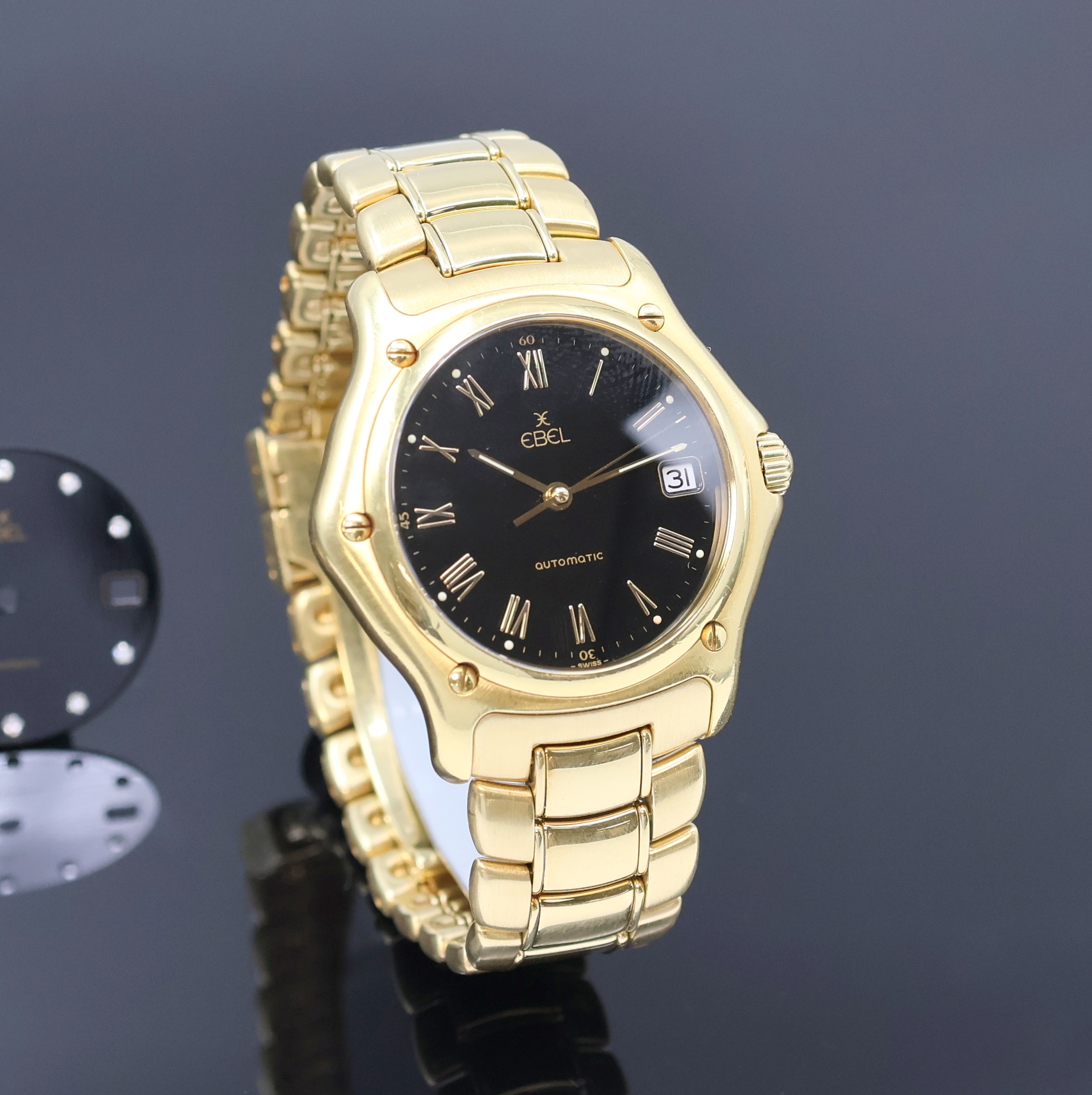 Detail b: EBEL 1911 Senior Herrenarmbanduhr in GG 750/000 Referenz 8080916, Schweiz um 1995, Automatik, massives Goldgeh. inkl. Gliederband m. Faltschl., zus. ...