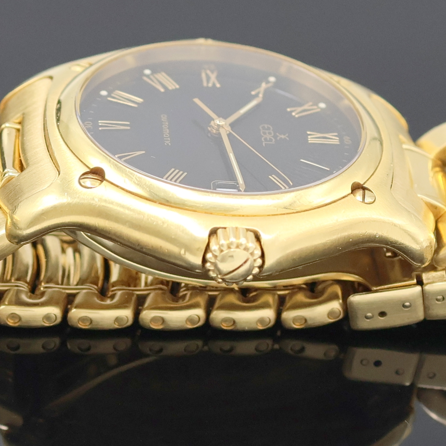 Detail d: EBEL 1911 Senior Herrenarmbanduhr in GG 750/000 Referenz 8080916, Schweiz um 1995, Automatik, massives Goldgeh. inkl. Gliederband m. Faltschl., zus. ...