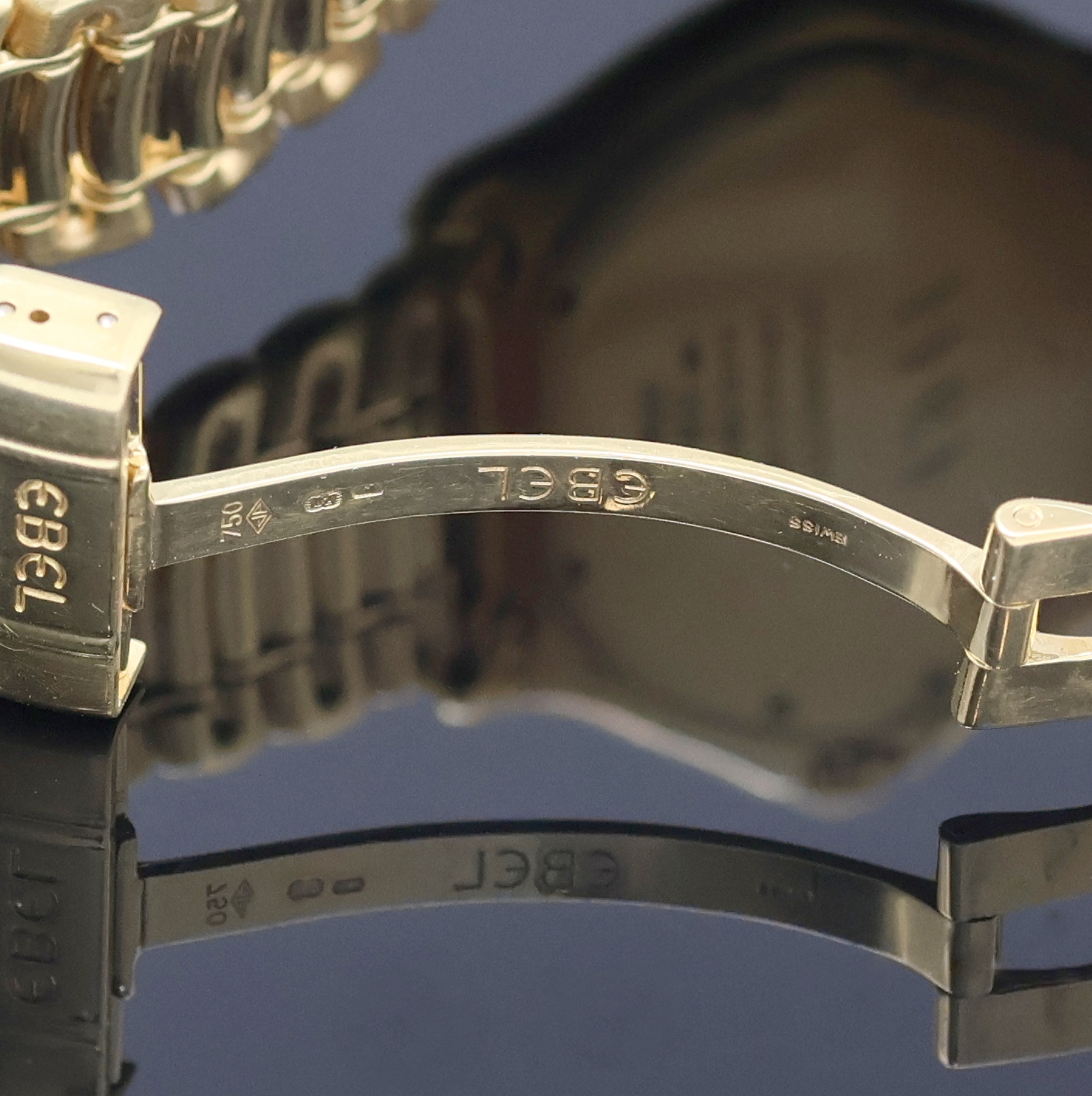 Detail e: EBEL 1911 Senior Herrenarmbanduhr in GG 750/000 Referenz 8080916, Schweiz um 1995, Automatik, massives Goldgeh. inkl. Gliederband m. Faltschl., zus. ...
