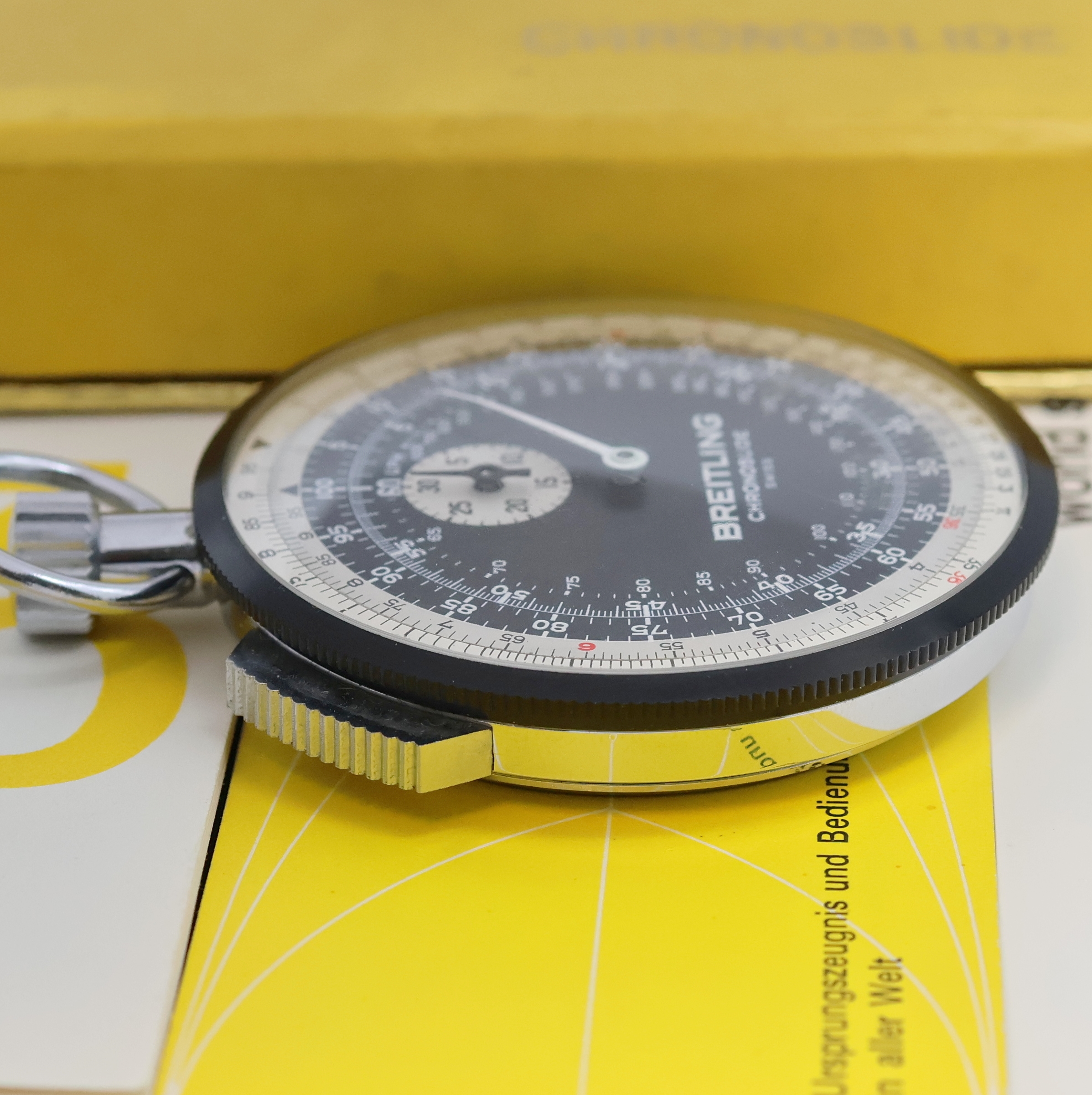 Detail b: BREITLING Chronoslide neuwertiger Einhandstopper Referenz 1577, Schweiz um 1969, Metall verchromt, 30 Min.-Stoppz., Multiskala, beids. drehb. ...
