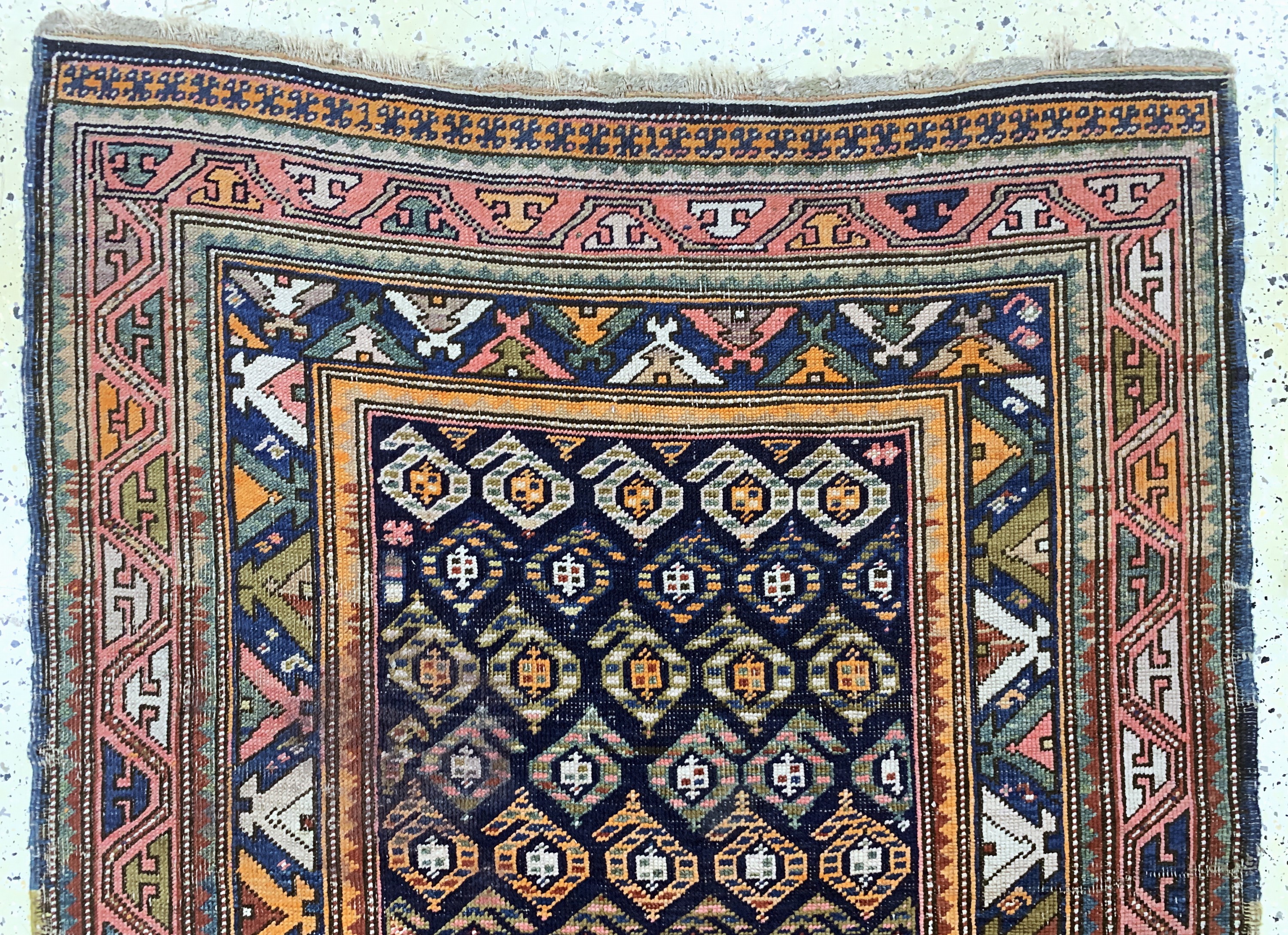 Detail a: Antiker Kazak, Kaukasus, 19.Jhd, Wolle auf Wolle, ca. 420 x 133 cm, EHZ: 3-4, (Restaurierungen)