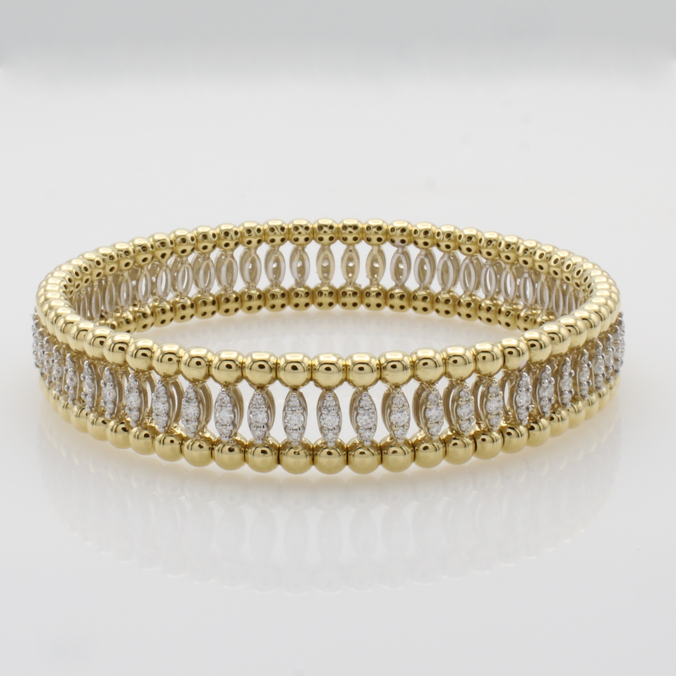 Image 27015108 - Flexibler Armreif mit Brillanten, GG/WG 750/000, Kugelumrandung in GG, navetteförm. WG- ...