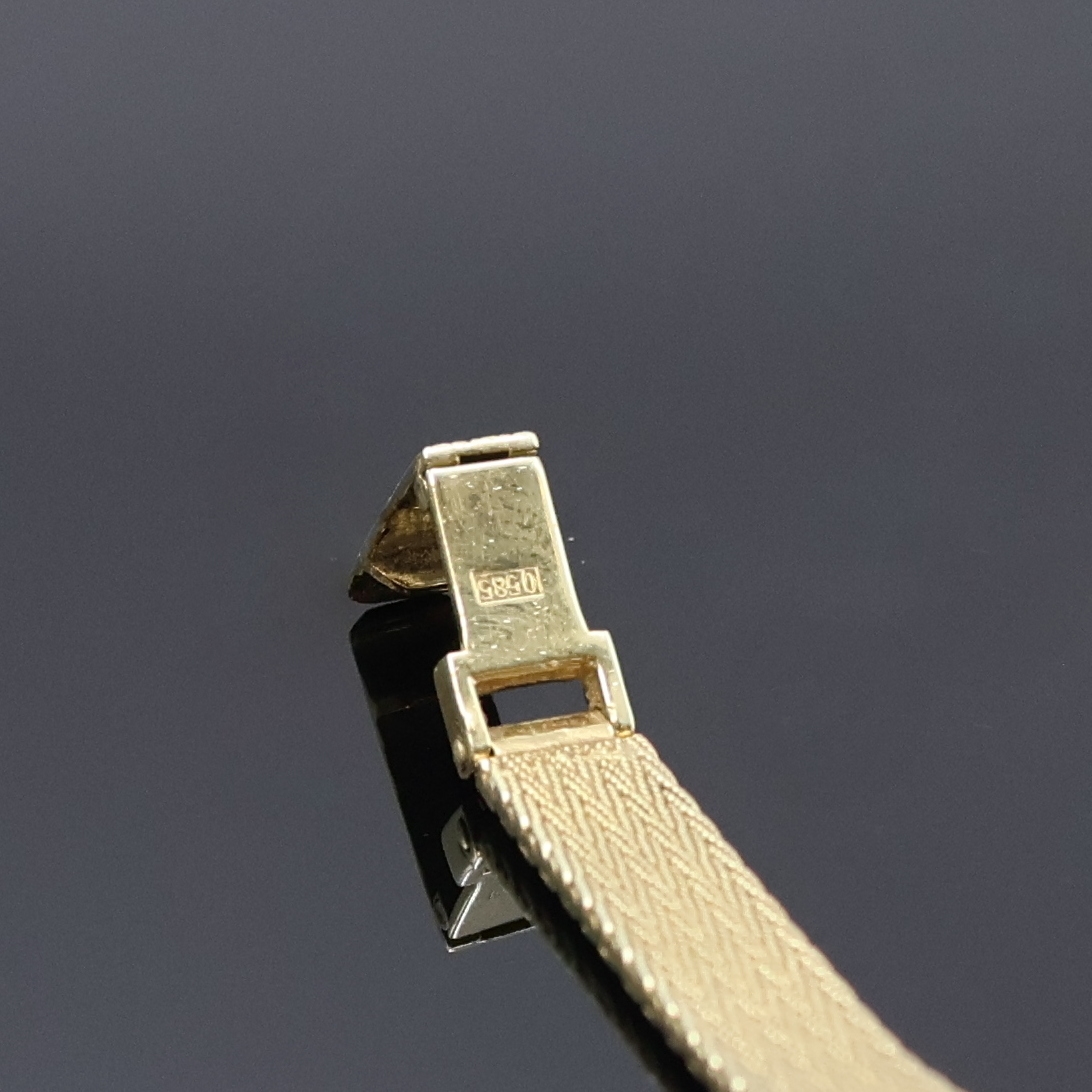 Detail b: CHRIST Damenarmbanduhr in GG 585/000 mit Diamanten, Schweiz um 1975, quarz, Goldband, Boden aufgedr., Lünette aufw. m. Diamanten bes., goldfarb. ...