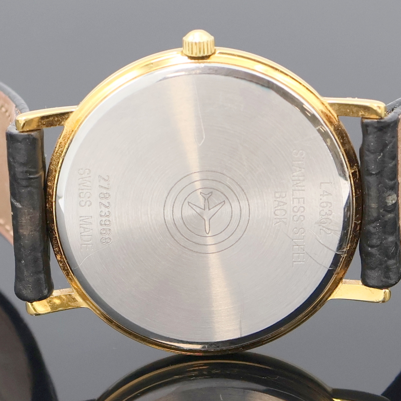 Detail e: LONGINES vergoldete Armbanduhr Referenz L4.636.2, Schweiz um 2000, quarz, Edelstahlboden aufgedr., orig. Lederband m. original Dornschl., weißes ...