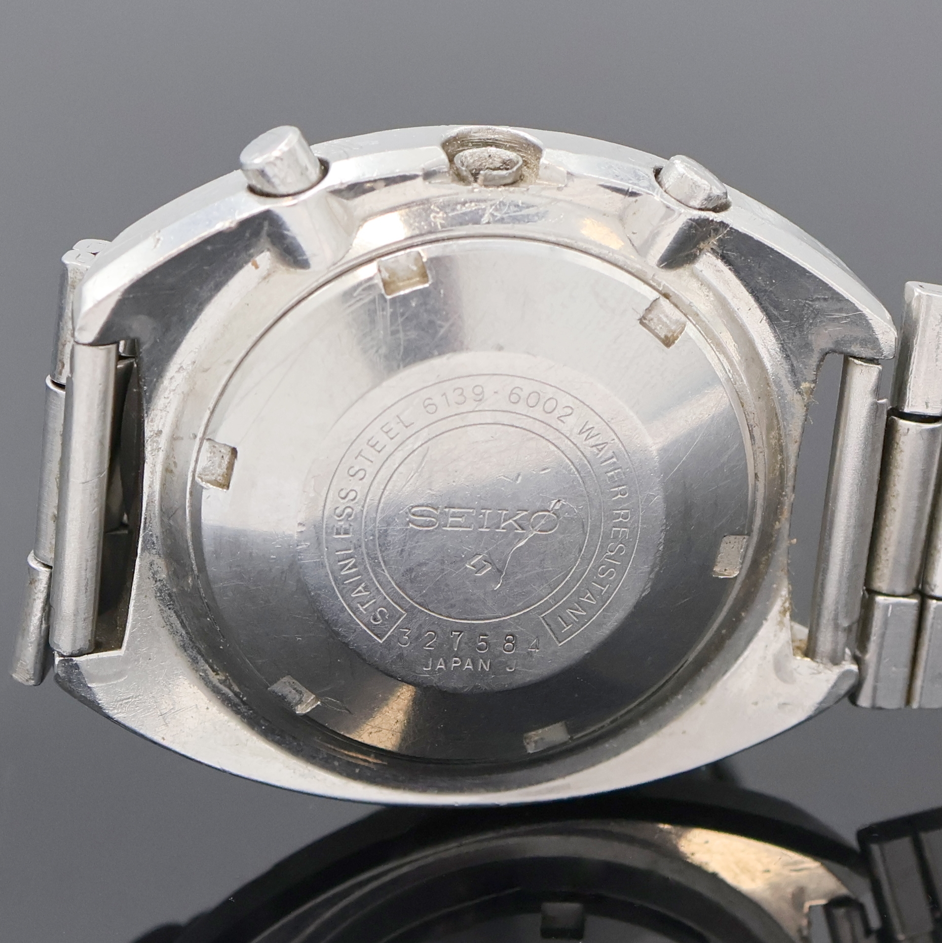 Detail c: SEIKO Herrenchronograph sogenannte "Pogue" Referenz 6139-6002, Japan um 1975, Automatik, Edelstahlgeh. m. neutr. Stahlband u. Faltschl. (zu ...