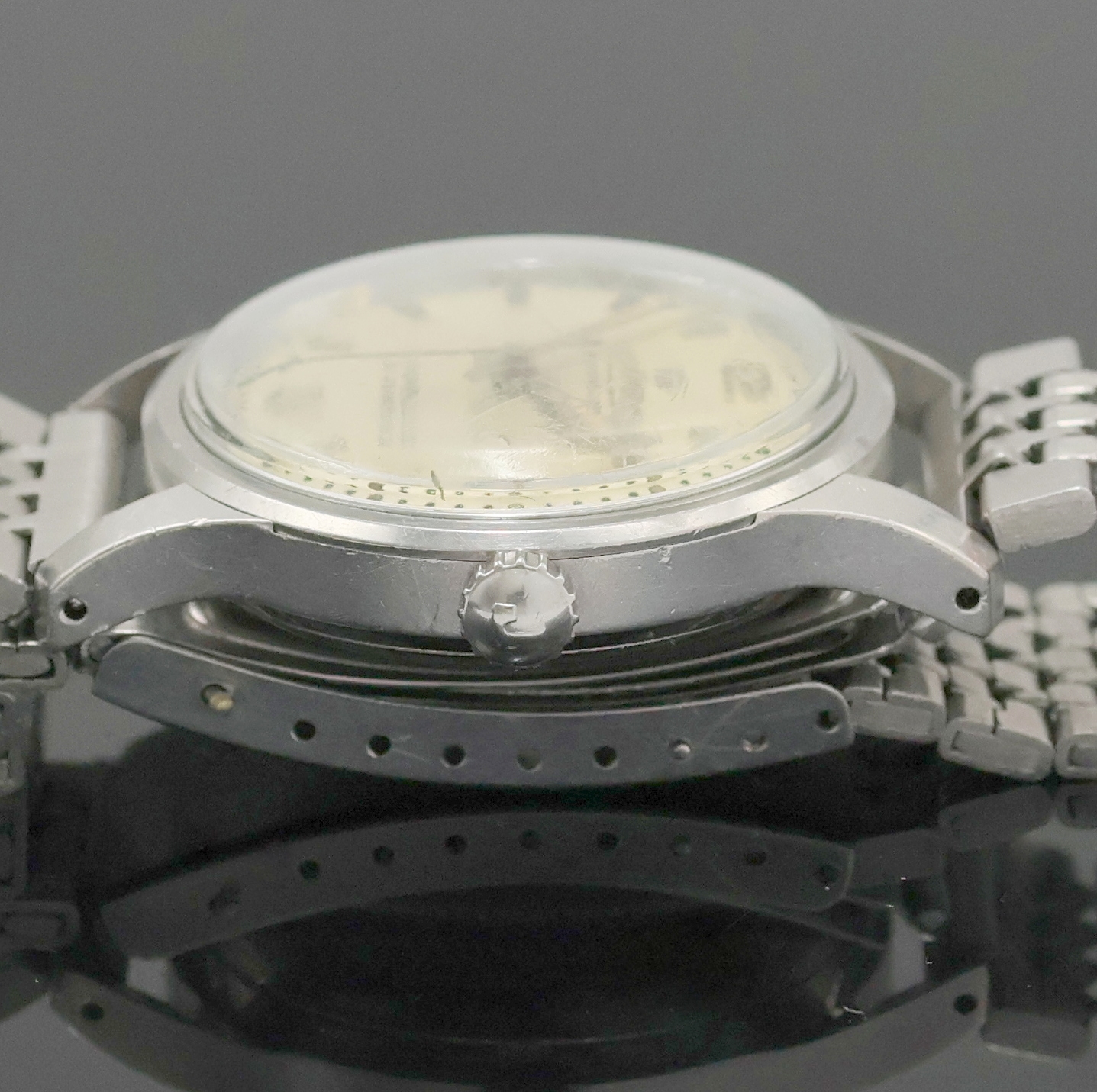 Detail d: ROAMER Rotopower Armbanduhr in Stahl Referenz 180459, Schweiz um 1960, Automatik, Boden aufgedr., Reiskornband m. Faltschl., silb. Zifferbl. pat., ...
